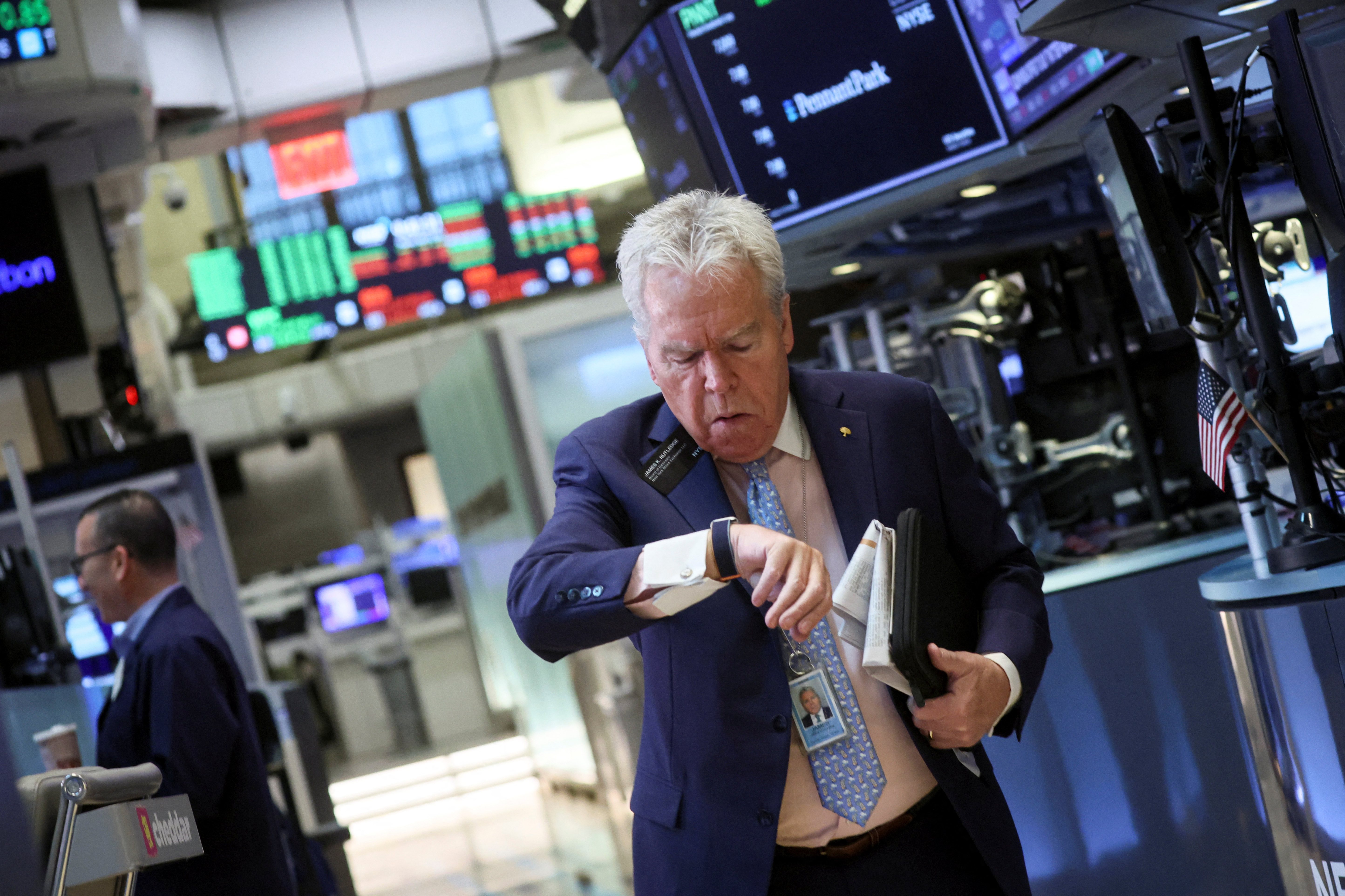 A trader works on the floor of the New York Stock Exchange (NYSE) in New York City, U.S.