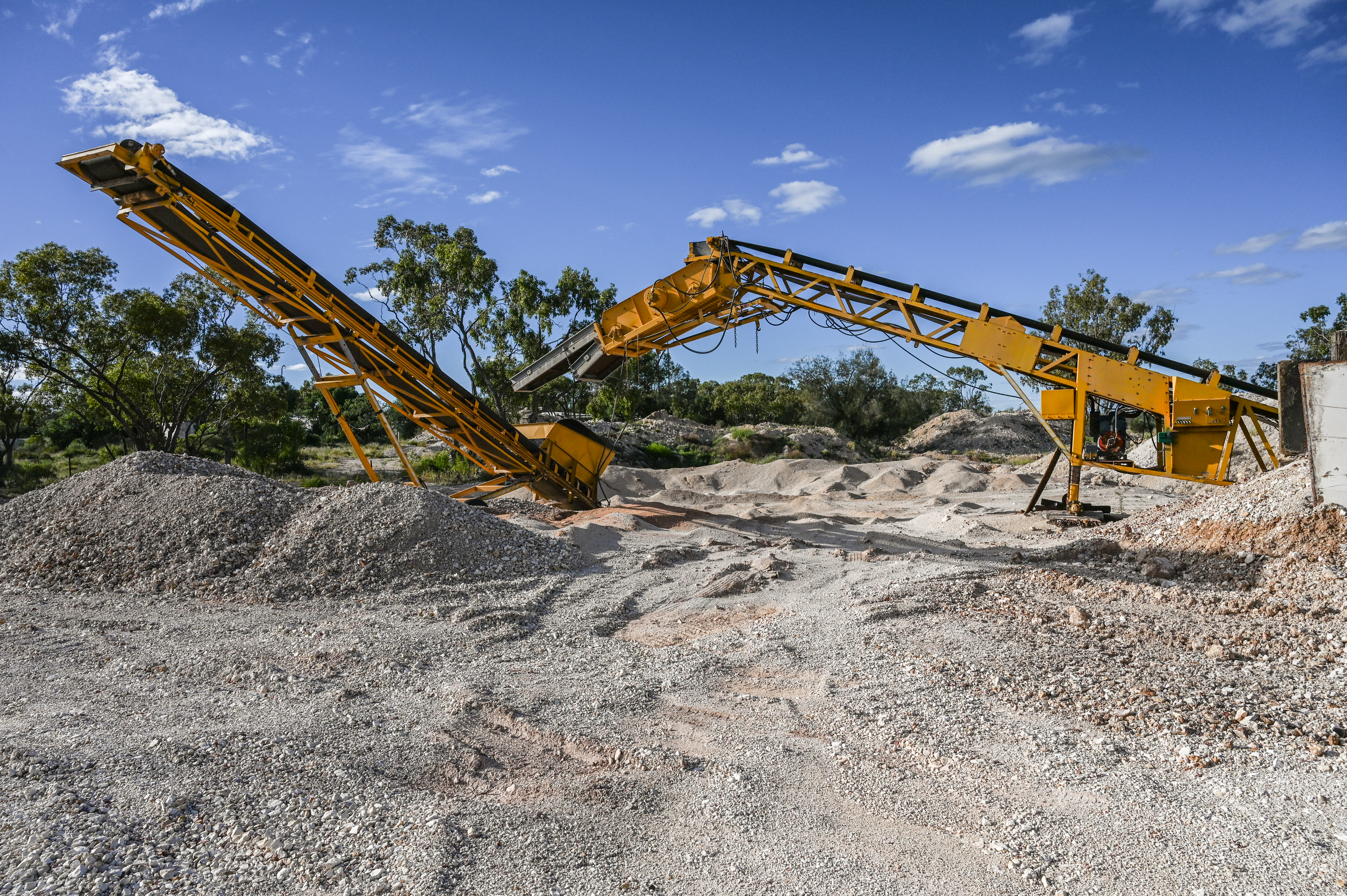 A photo of conveyor belts for loading excavated earth onto trucks.