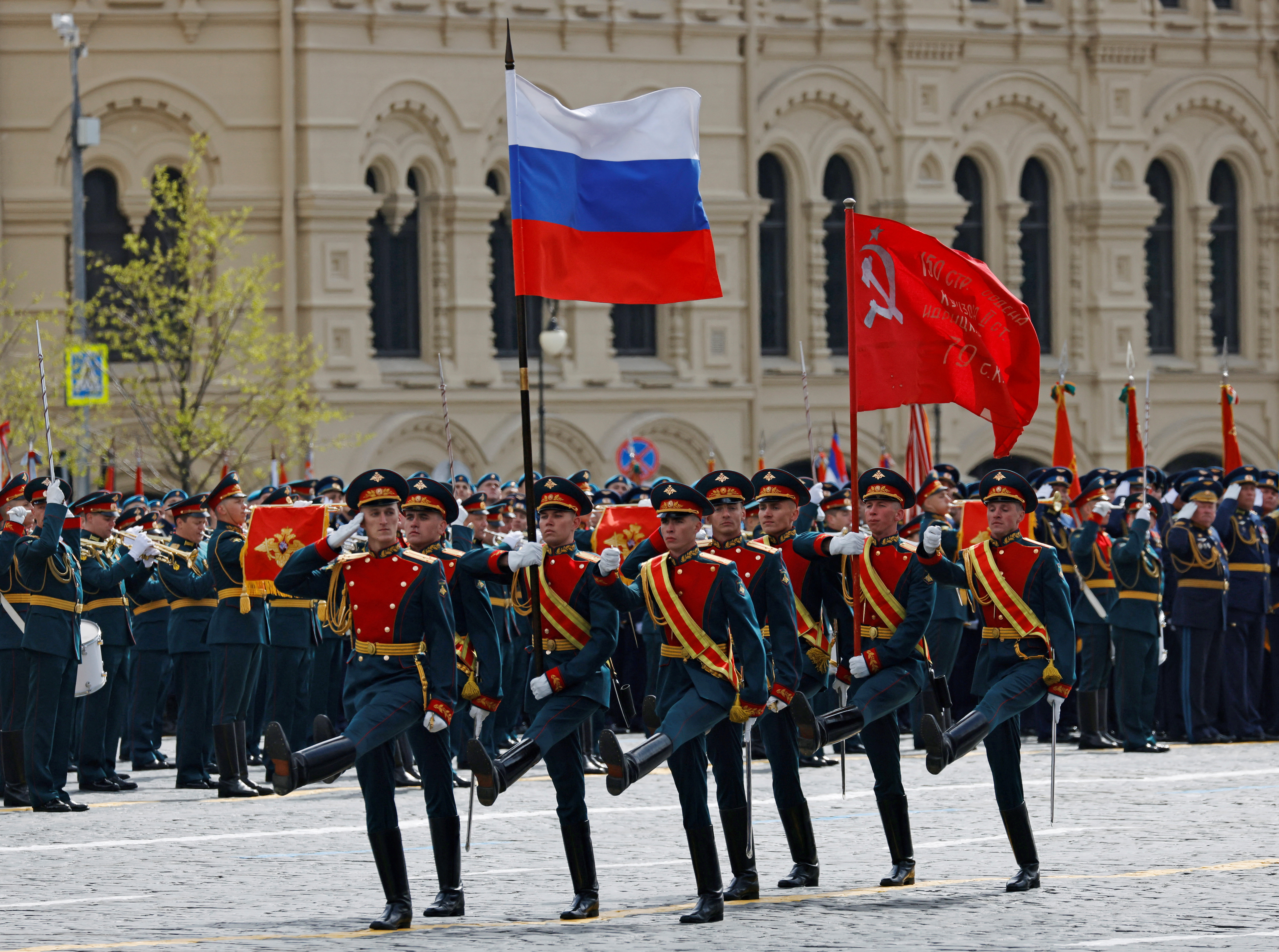 Russian service members take part in a military parade on Victory Day