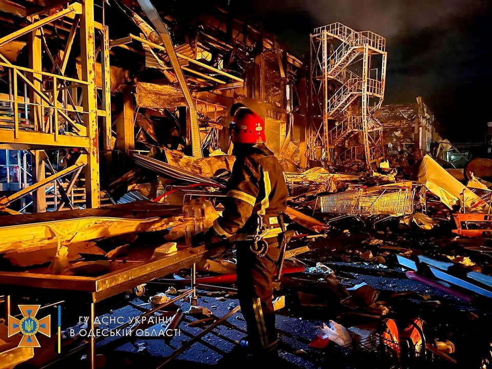 A first responder works at the site of a missile strike, amid Russia's invasion of Ukraine, in Odesa, Ukraine in this handout image released May 10, 2022. State Emergency Service of Ukraine/Handout via REUTERS THIS IMAGE HAS BEEN SUPPLIED BY A THIRD PARTY. MANDATORY CREDIT.