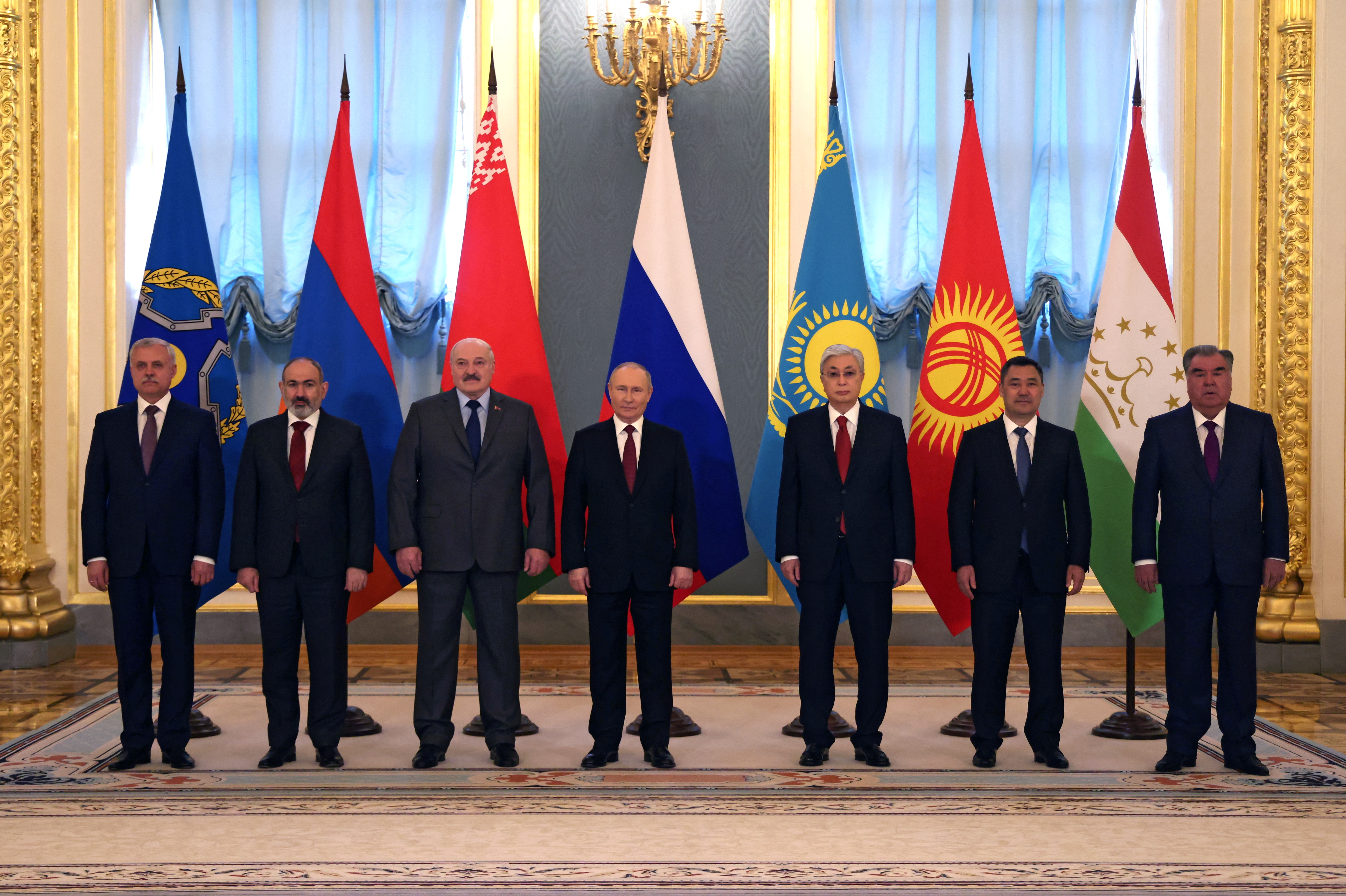 General Secretary of the Collective Security Treaty Organization (CSTO) Stanislav Zas, Armenian Prime Minister Nikol Pashinyan, Belarusian President Alexander Lukashenko, Russian President Vladimir Putin, Kazakh President Kassym-Jomart Tokayev, Kyrgyz President Sadyr Japarov and Tajik President Emomali Rakhmon pose for a picture during the CSTO summit at the Kremlin in Moscow.