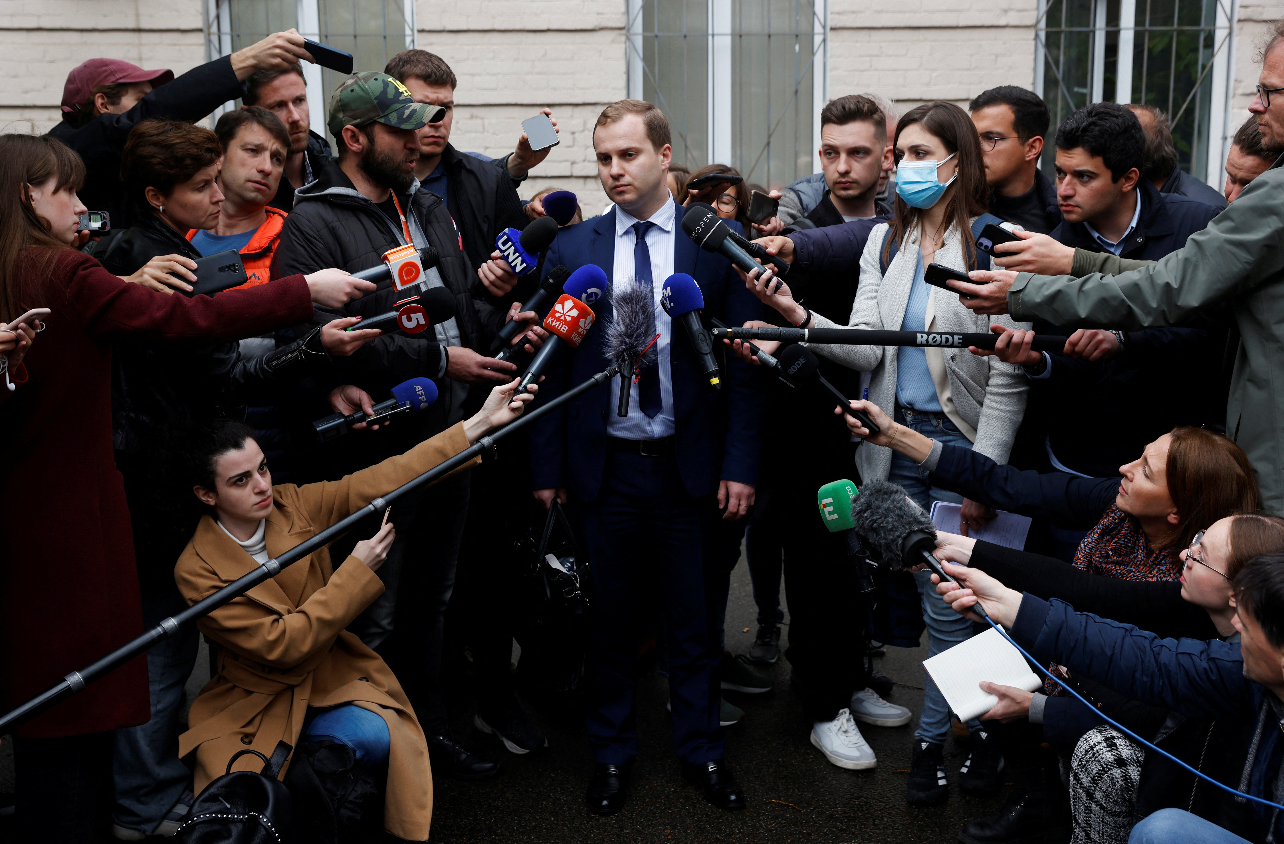 Ukrainian prosecutor Andviy Syniuk speaks to the media