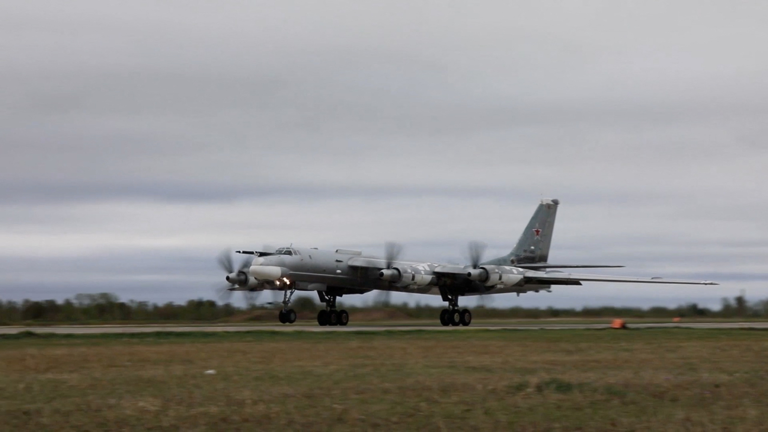 Russian Tu-95 strategic bomber takes off during Russian-Chinese military aerial exercises to patrol the Asia-Pacific region
