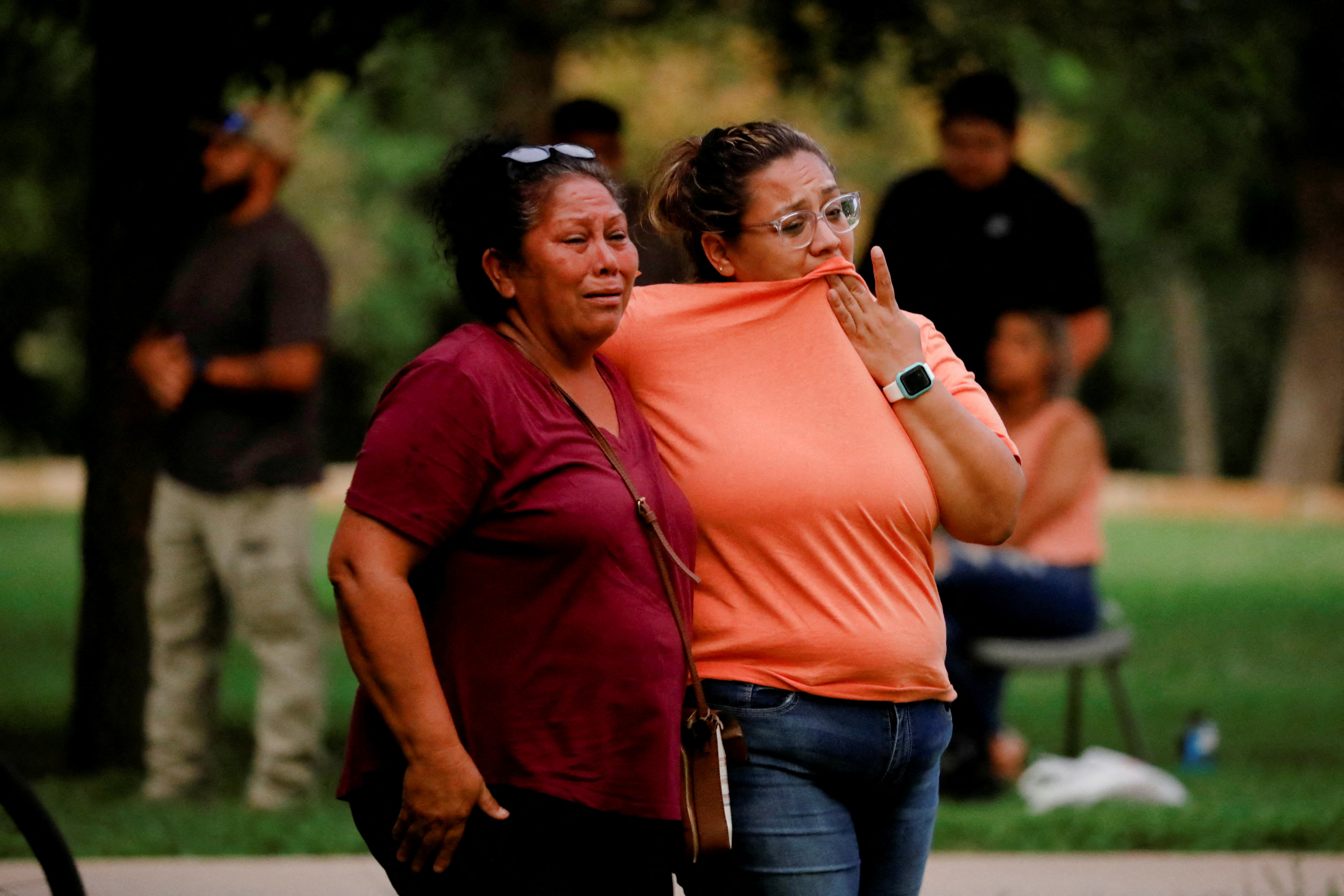 People react outside the Ssgt Willie de Leon Civic Center