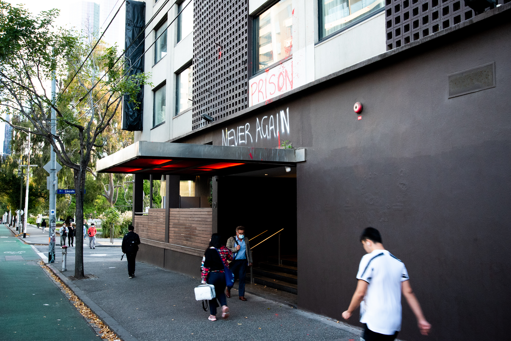 Graffiti on the wall of the notorious Park Hotel reading 'Never Again'