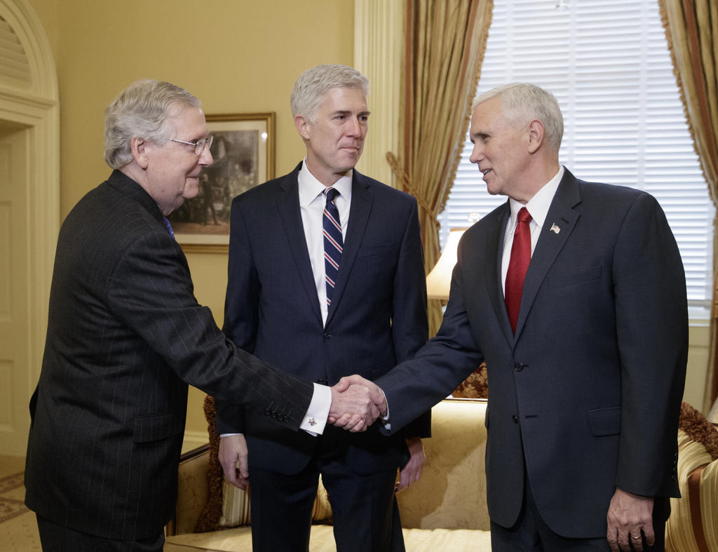 Supreme Court Justice nominee, Neil Gorsuch, center, joined by Vice President Mike Pence, right, meets with Senate Majority Leader Mitch McConnell of Ky. on Capitol Hill in Washington, in 2017.