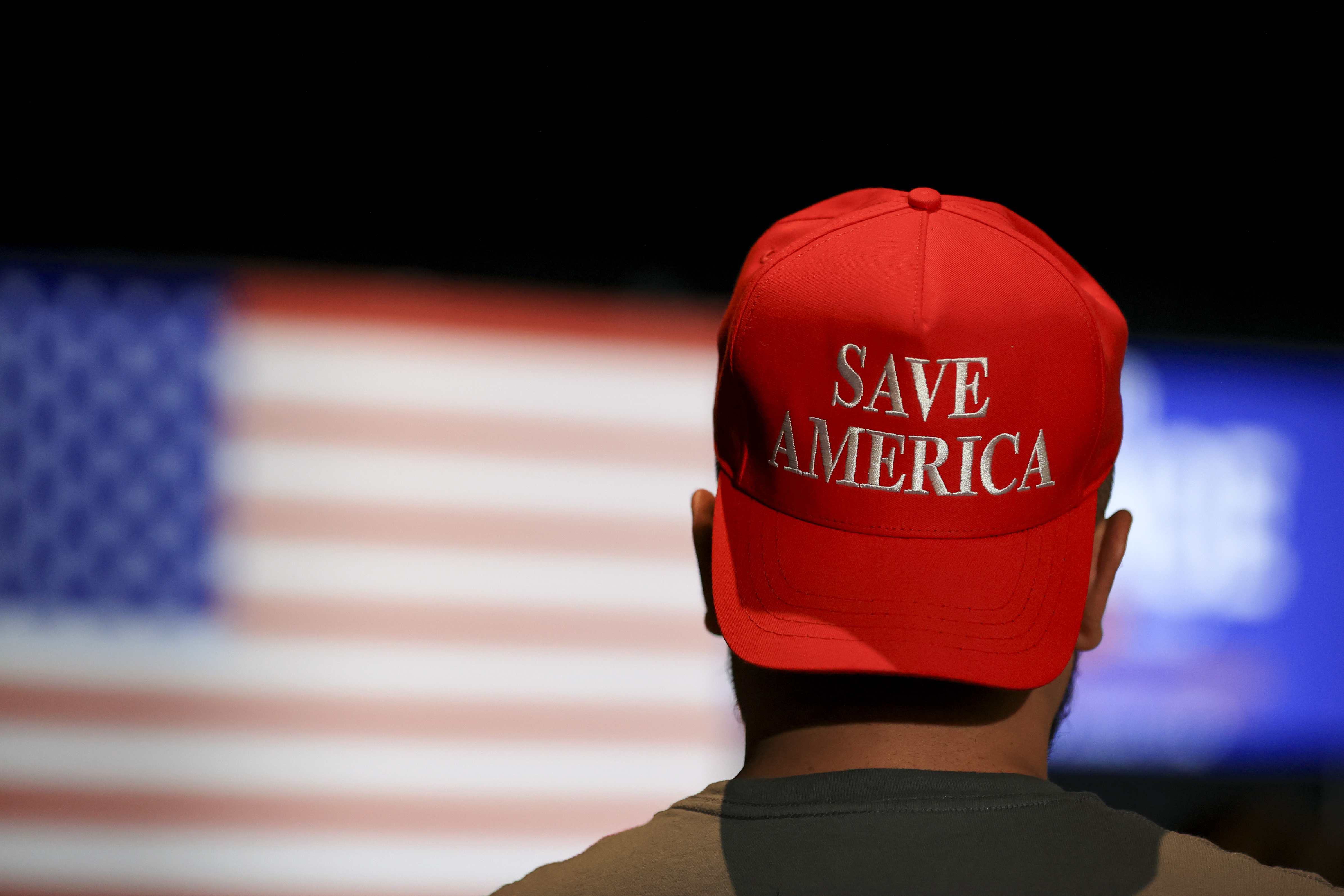 A supporter wears a 'Save America' hat during an election night watch party in Ohio, US