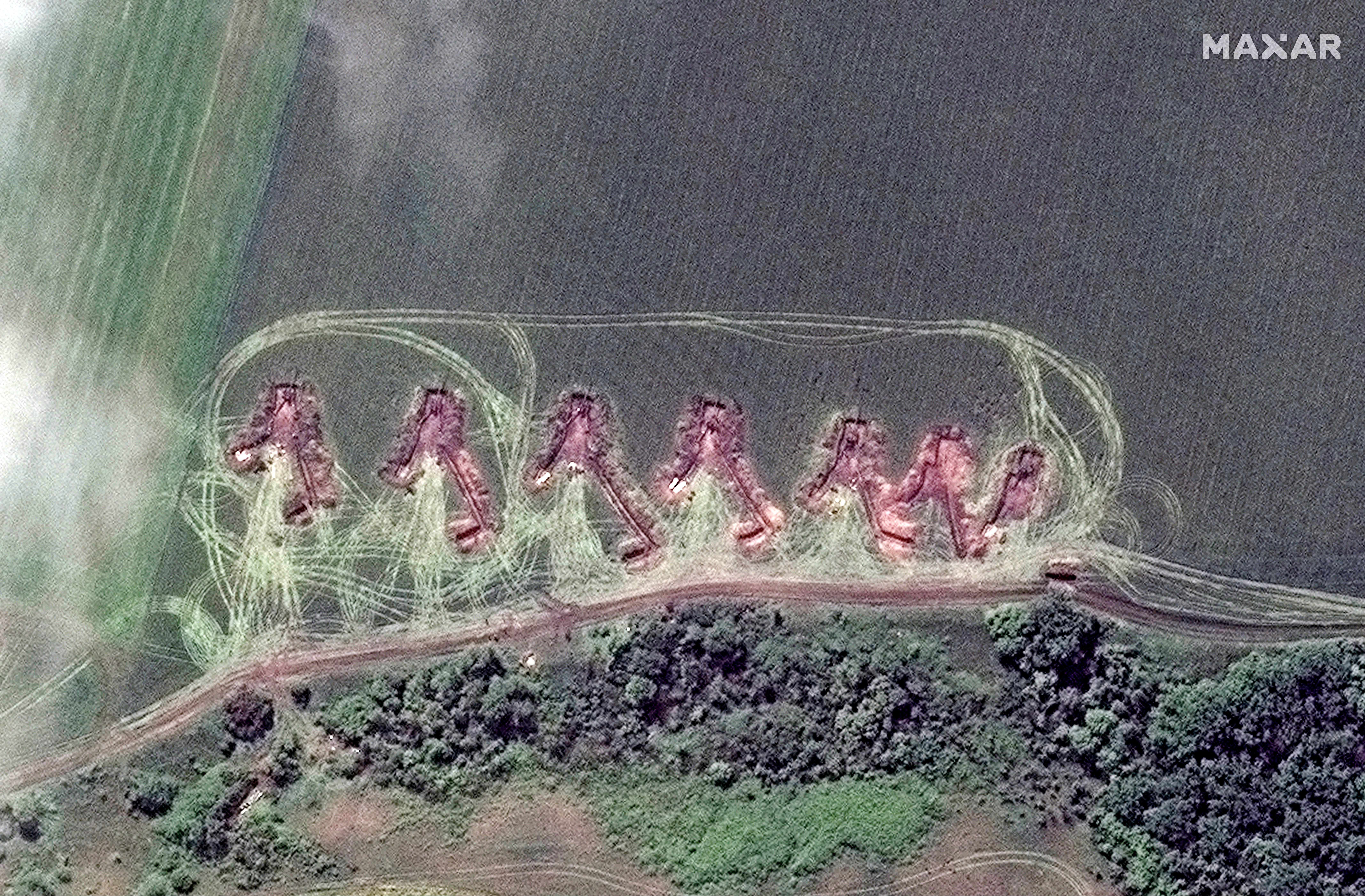 satellite image provided by Maxar Technologies shows towed artillery in firing position deployed in the north of Lyman, Ukraine