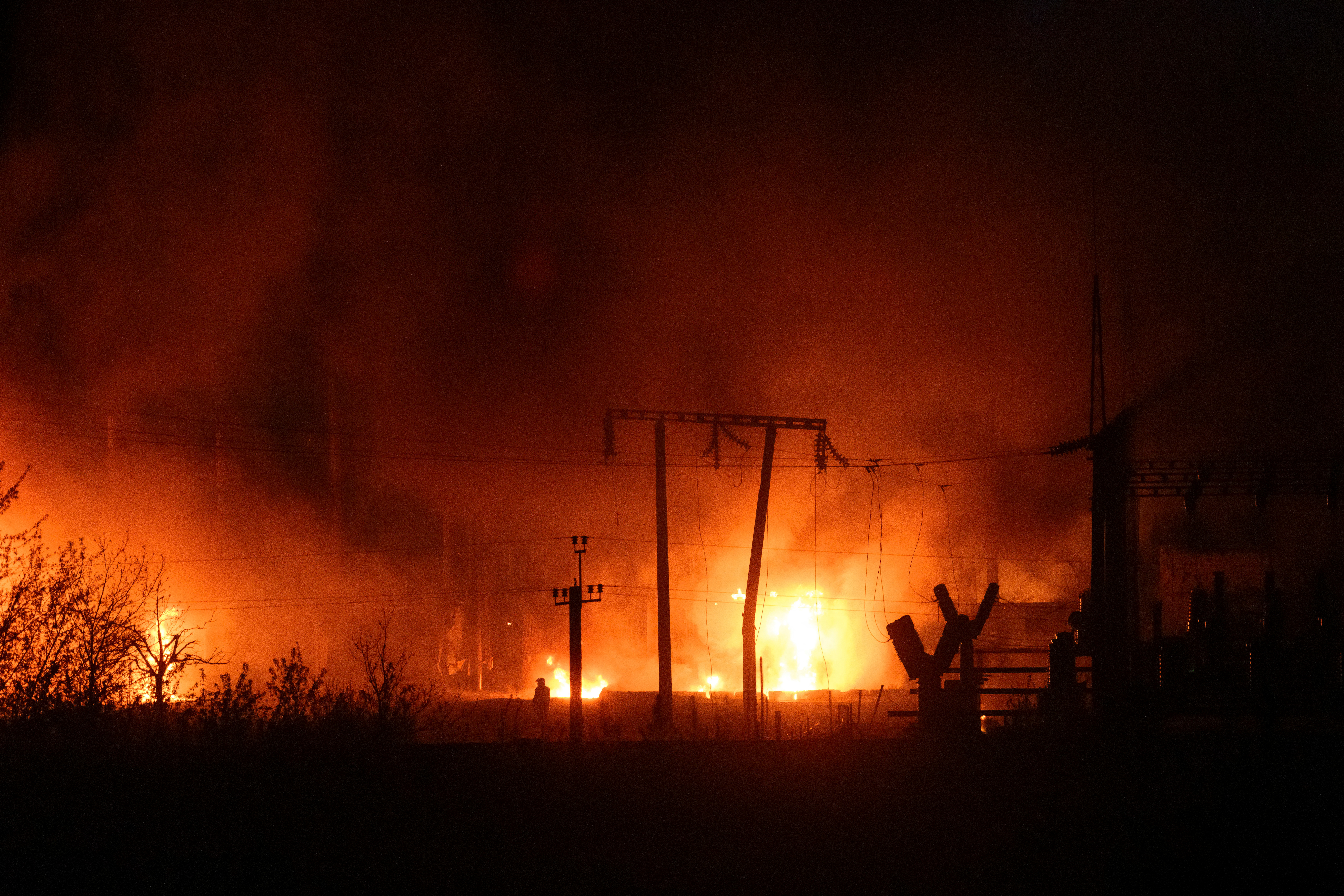 Power substation burns after a missile strike in Lviv