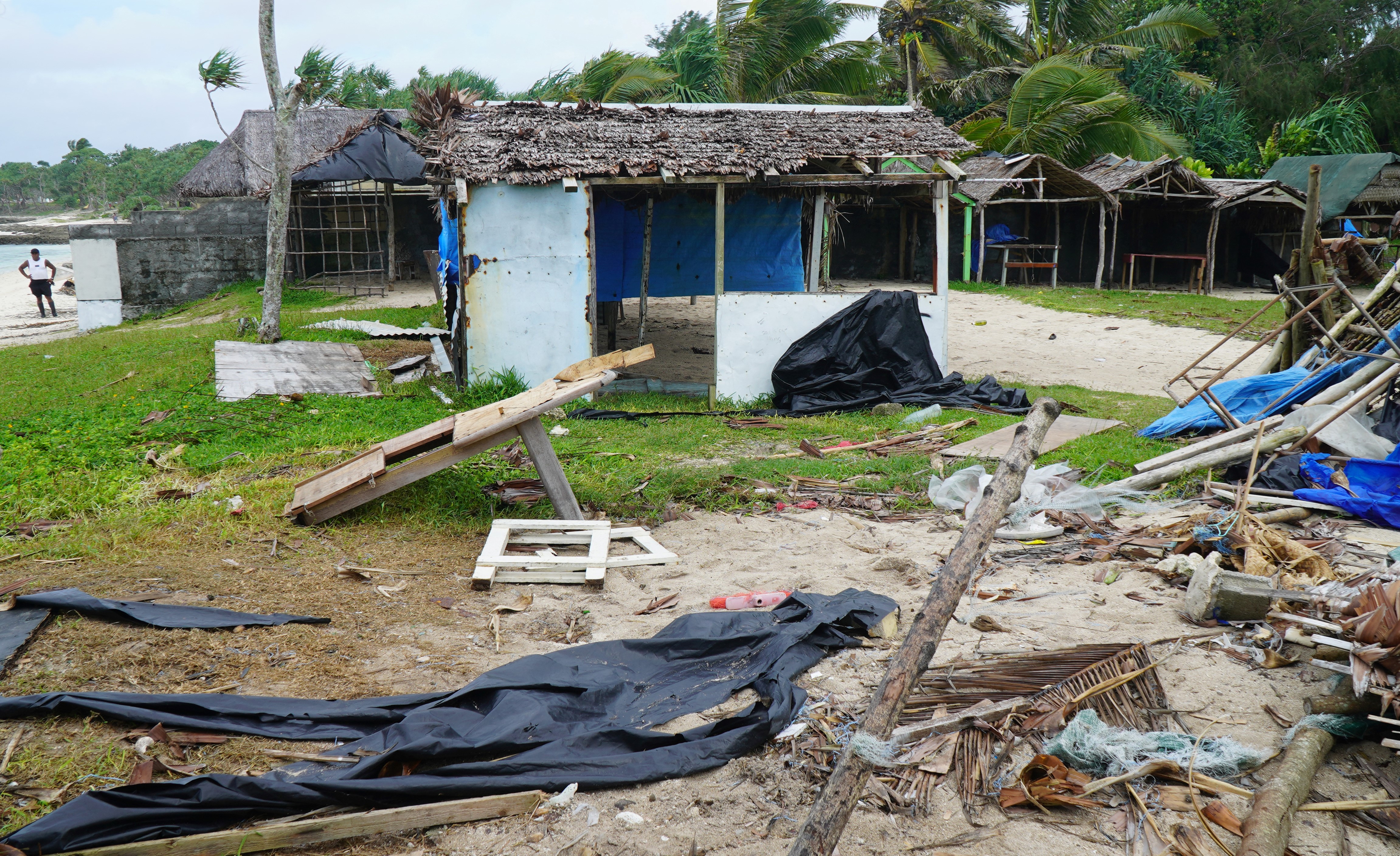 Damaged buildings are seen near Vanuatu's capital Port Vila in 2020 after Tropical Cyclone Harold pounded the islands