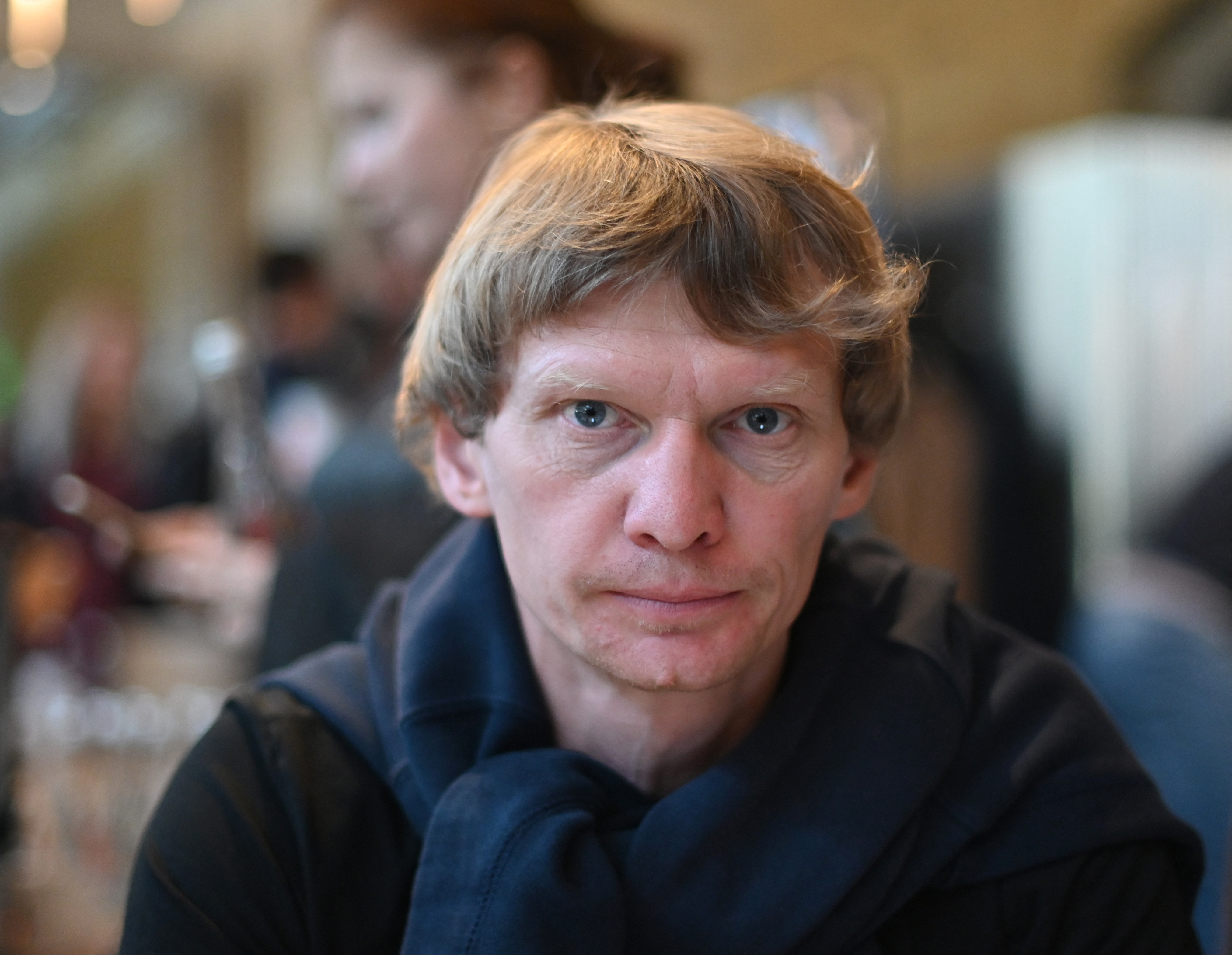 Ukrainian photographer and documentary maker Maks Levin poses in Kyiv.