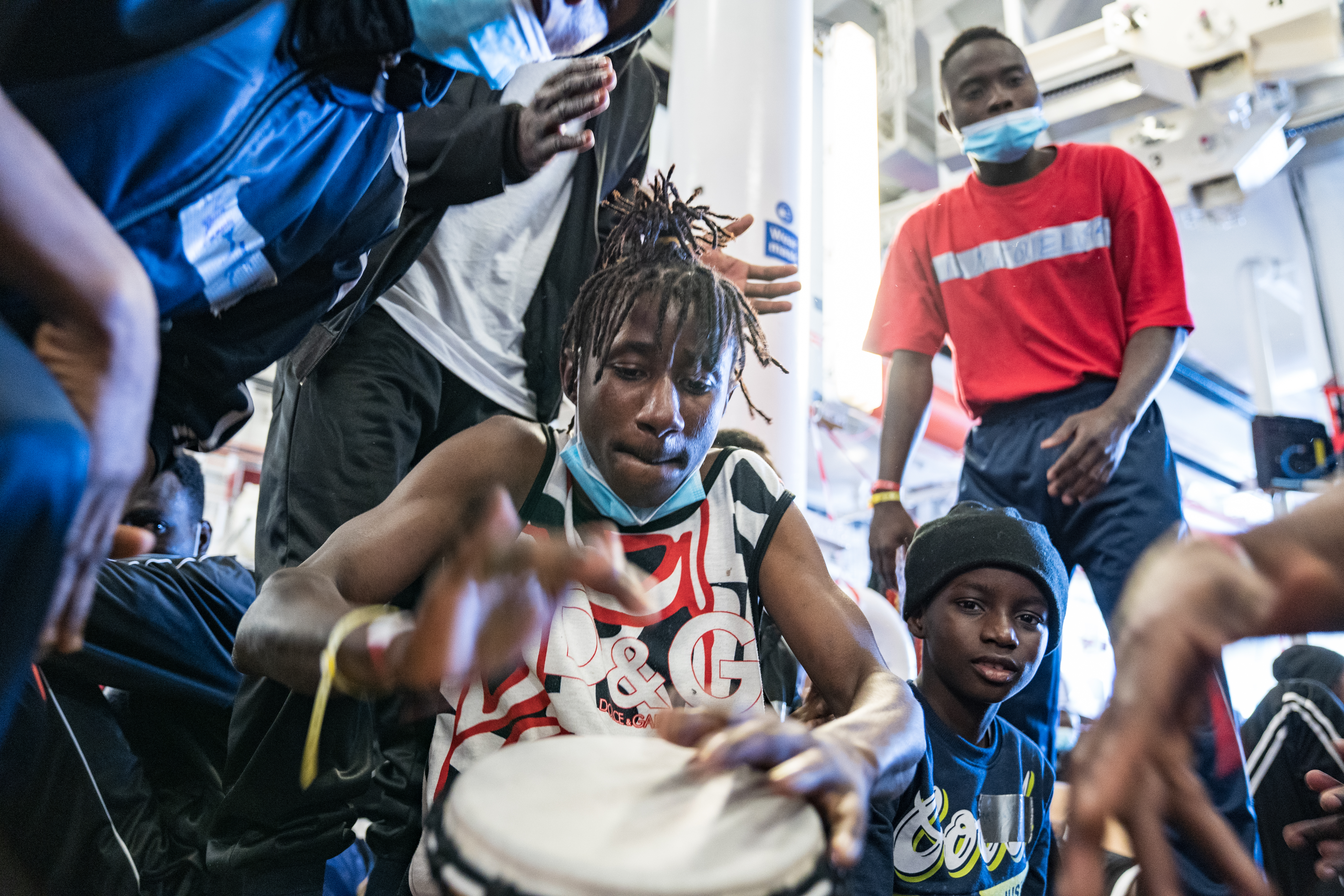 Survivors on the deck of a rescue ship in the Med sea