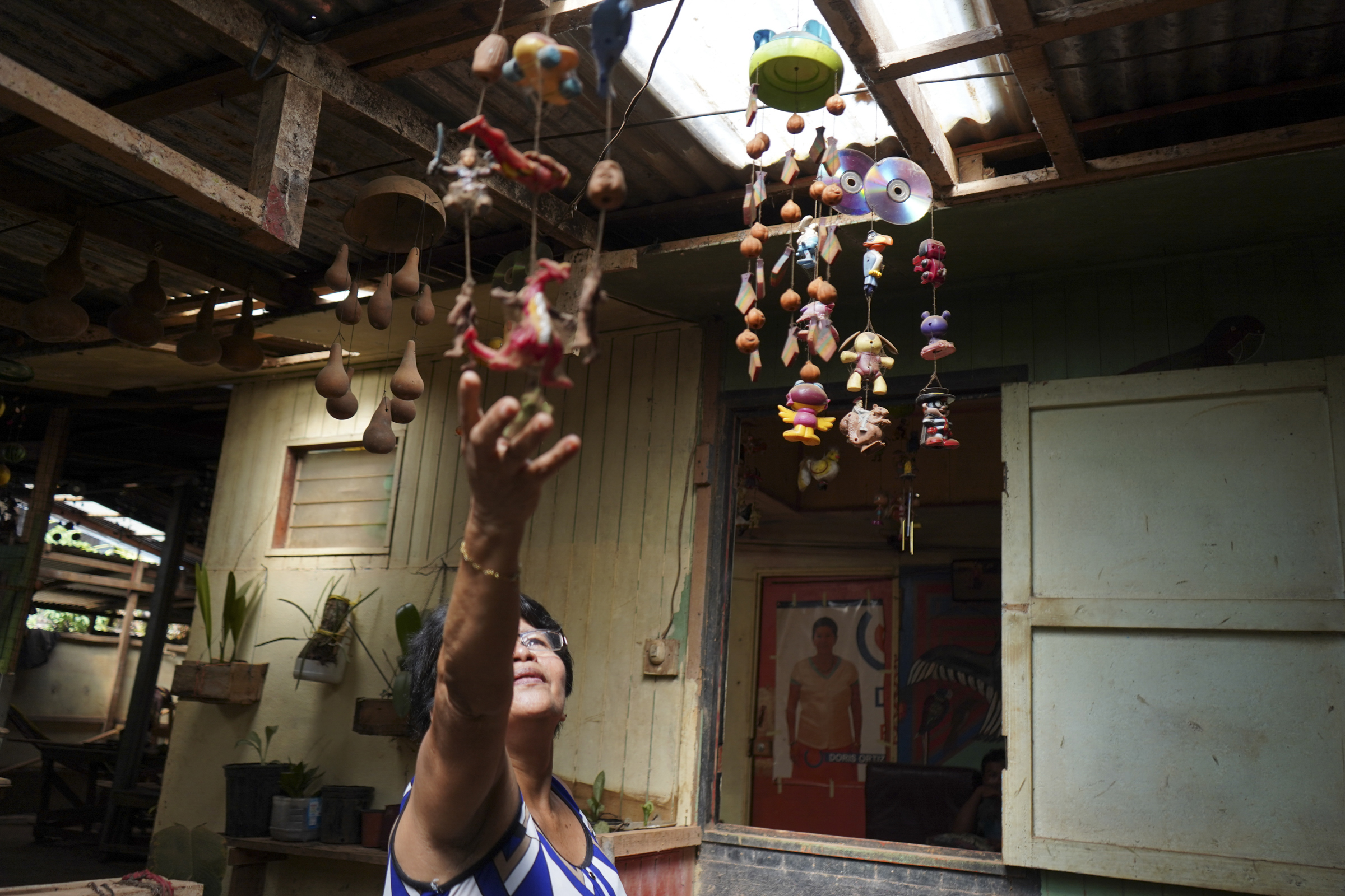 A photo of Doris Ortiz, 65, inside her home in the Salitre territory.