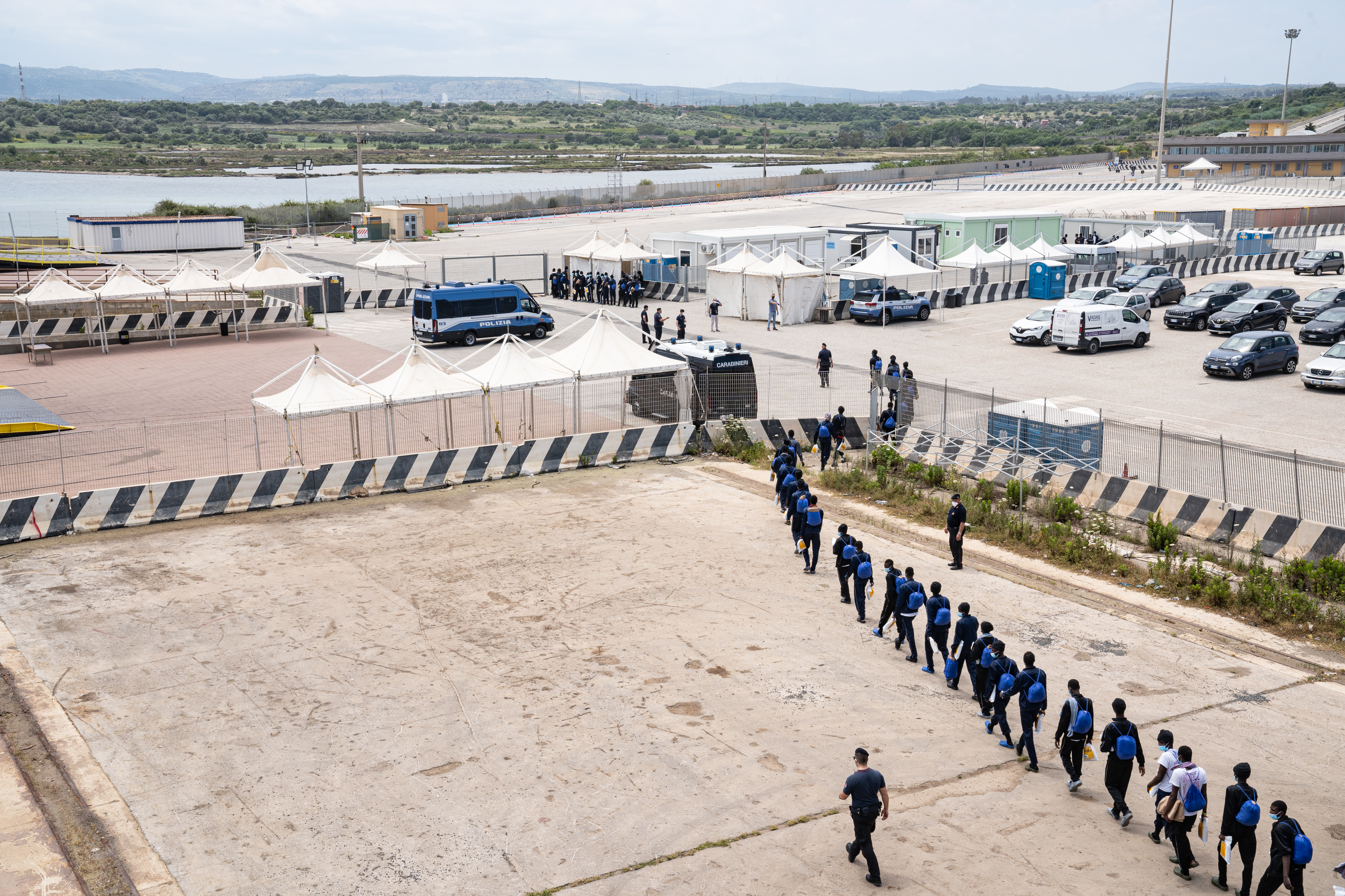 Survivors rescued in the Med Sea are processed by the Italian authorities