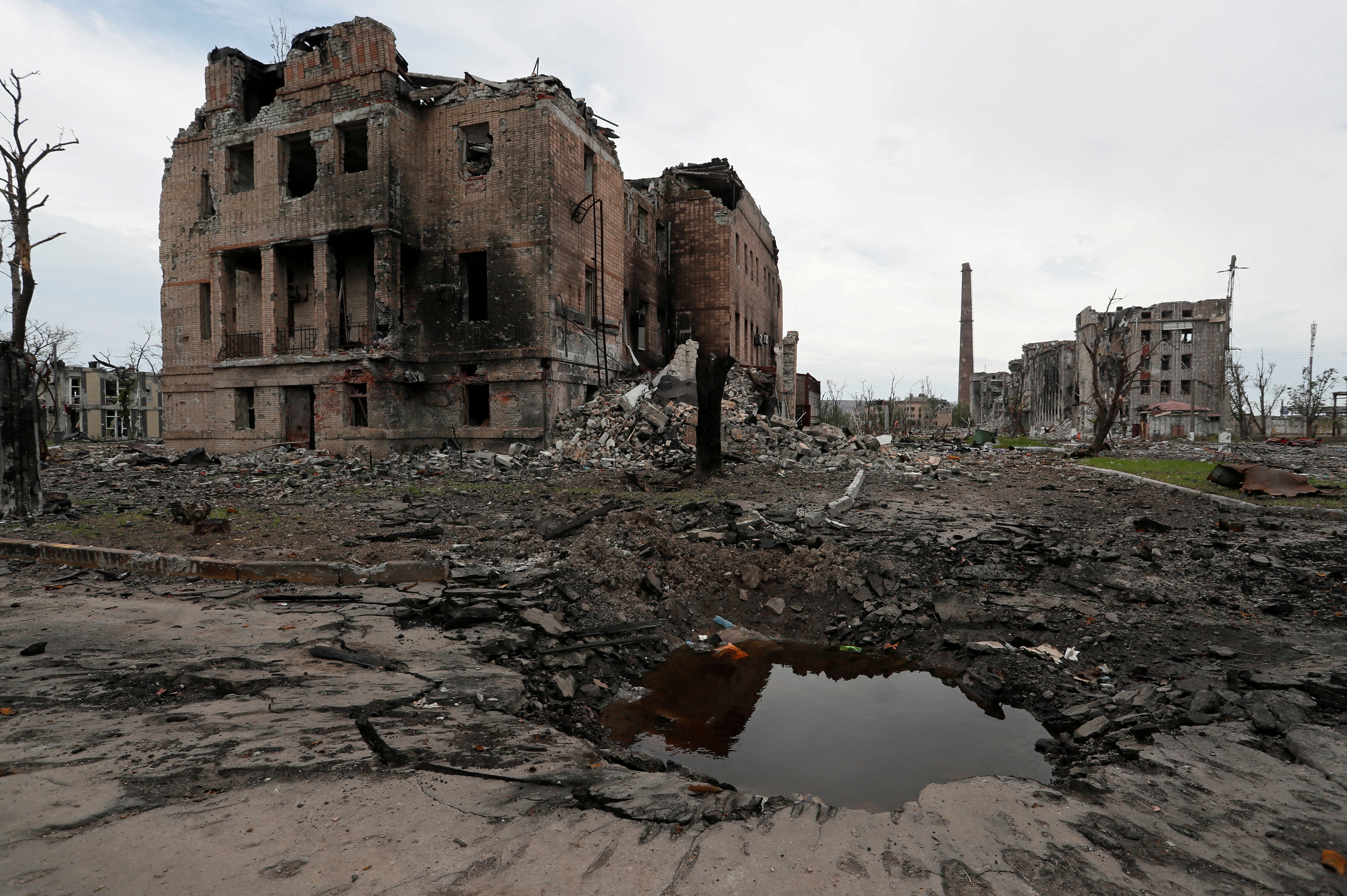 Destroyed buildings are seen in Mariupol