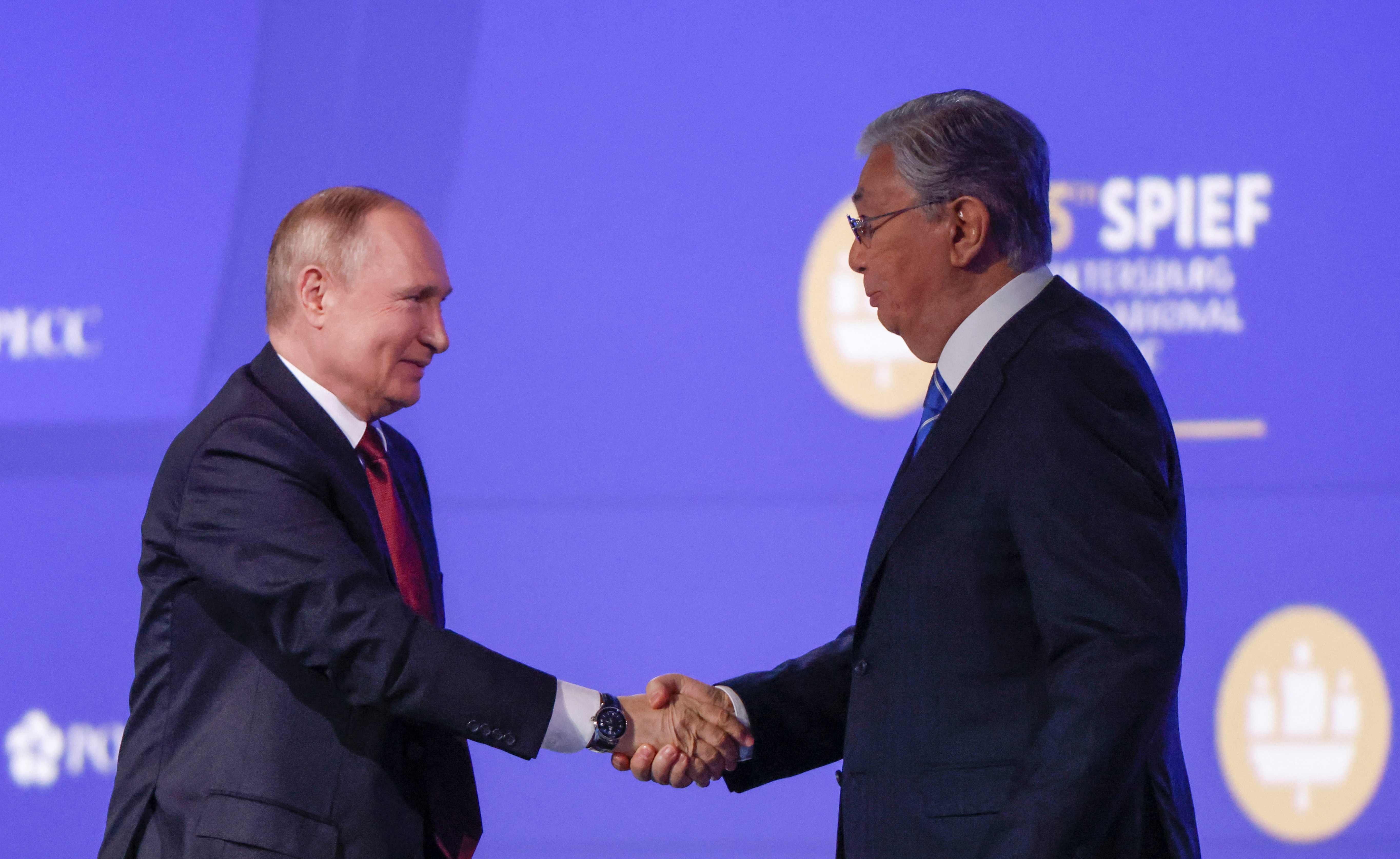 Russian President Vladimir Putin and Kazakh President Kassym-Jomart Tokayev attend a session of the St. Petersburg International Economic Forum (SPIEF) on June 17, 2022 [Maxim Shemetov/Reuters]