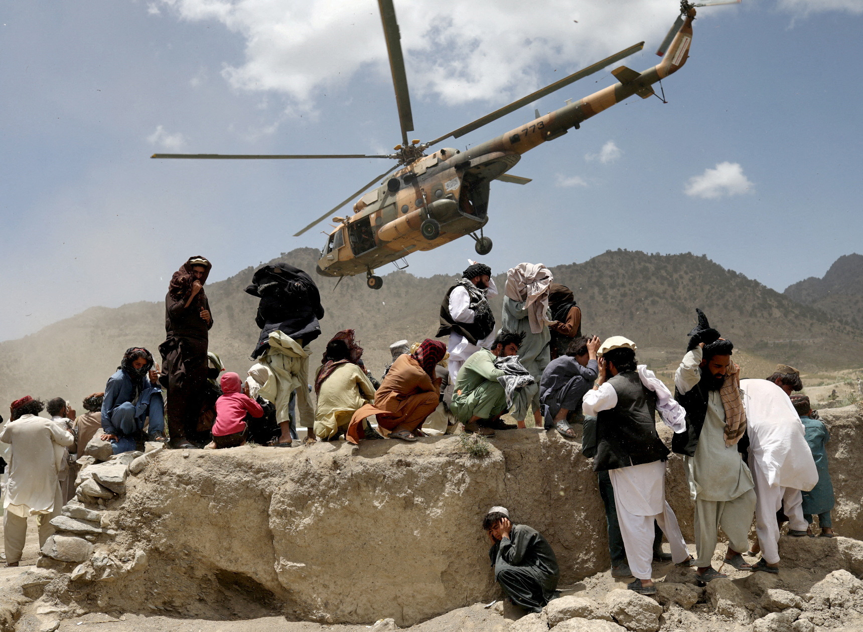 A Taliban helicopter takes off after bringing aid to the site of an earthquake in Gayan, Afghanistan