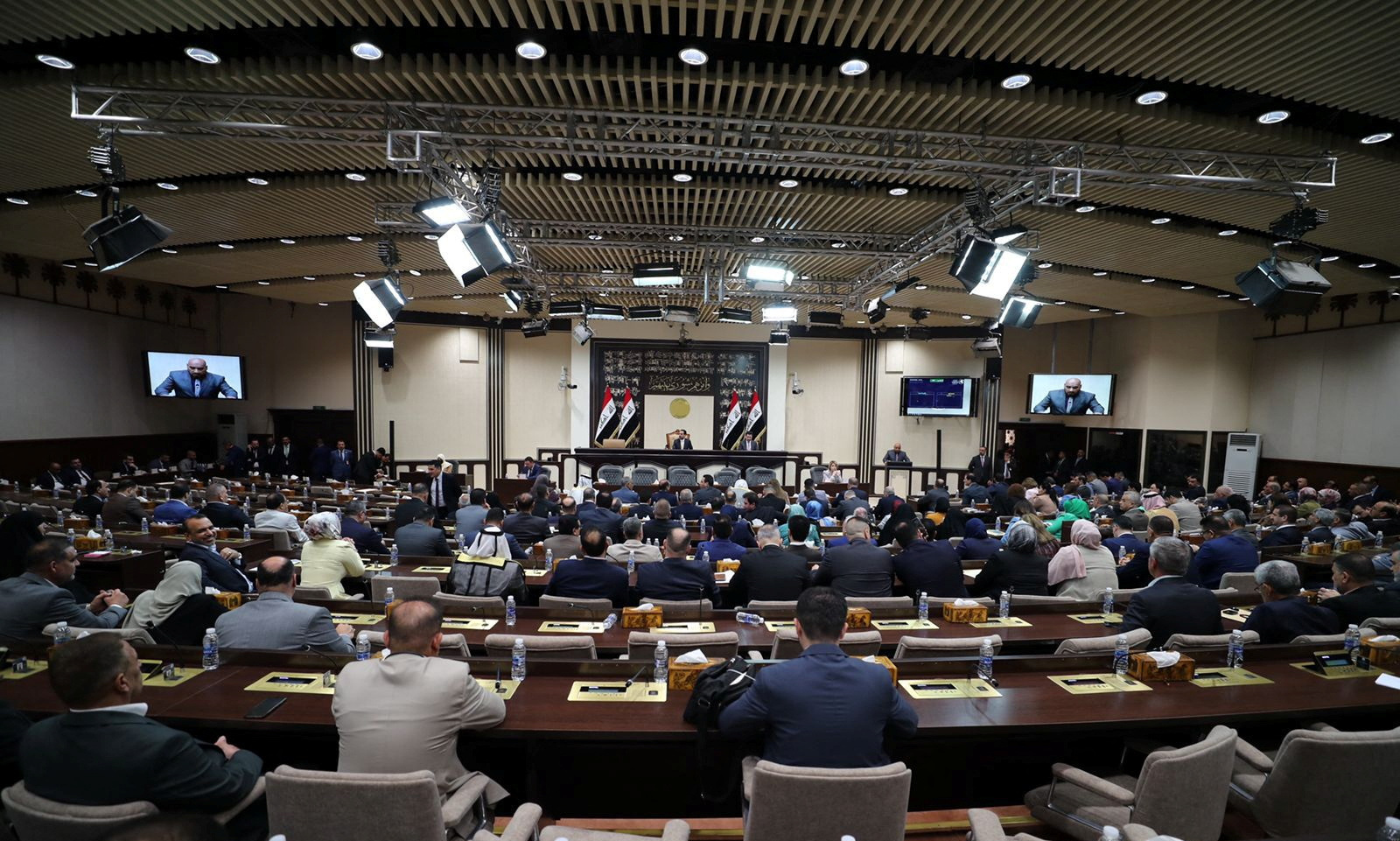 Iraqi lawmakers attend a session of the Iraqi parliament