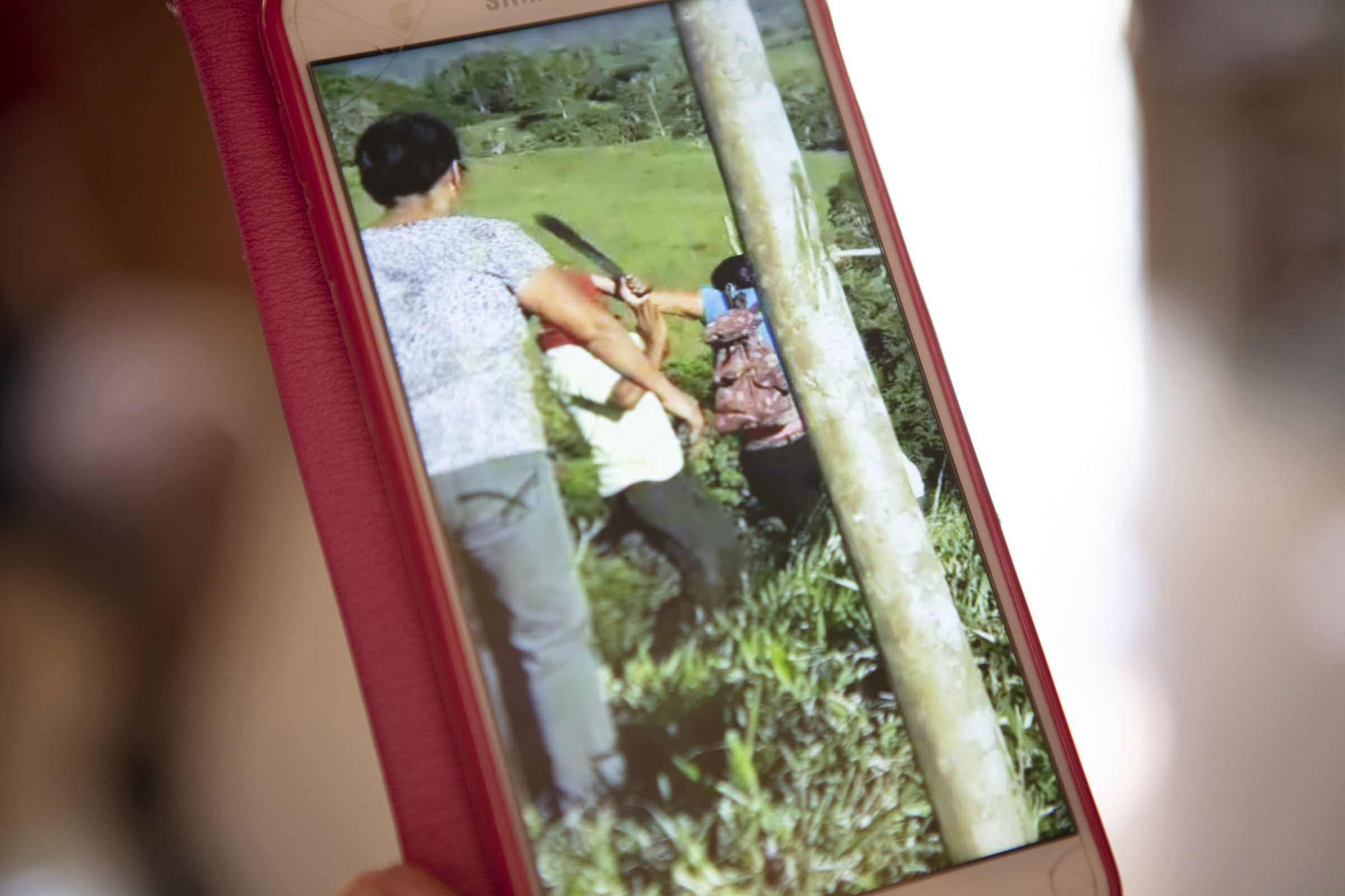 A photo of a close-up detail of a phone recording of an elder under attack during the seizure of Vargas-Cascante’s third farm.