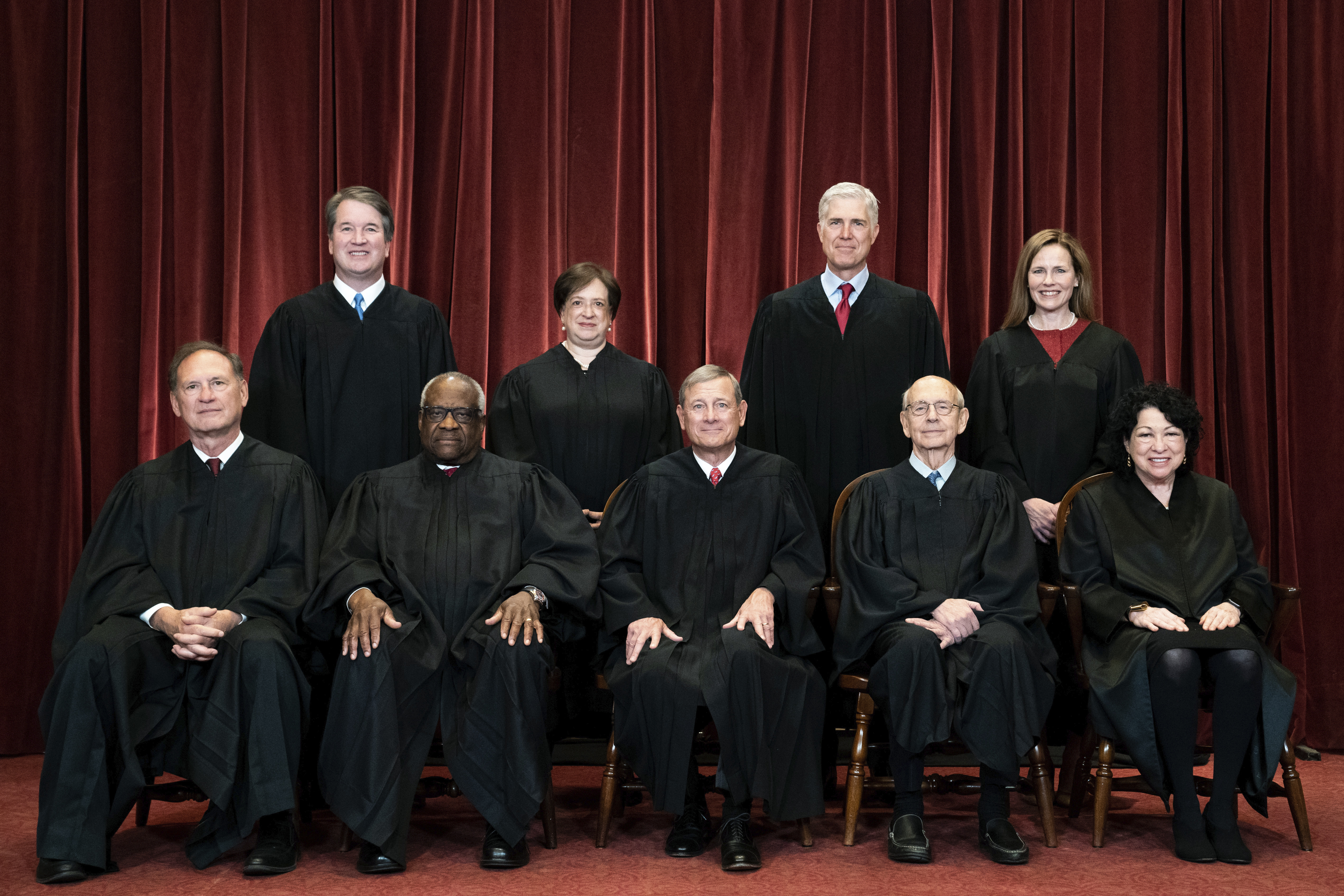 Members of the Supreme Court pose for a group photo