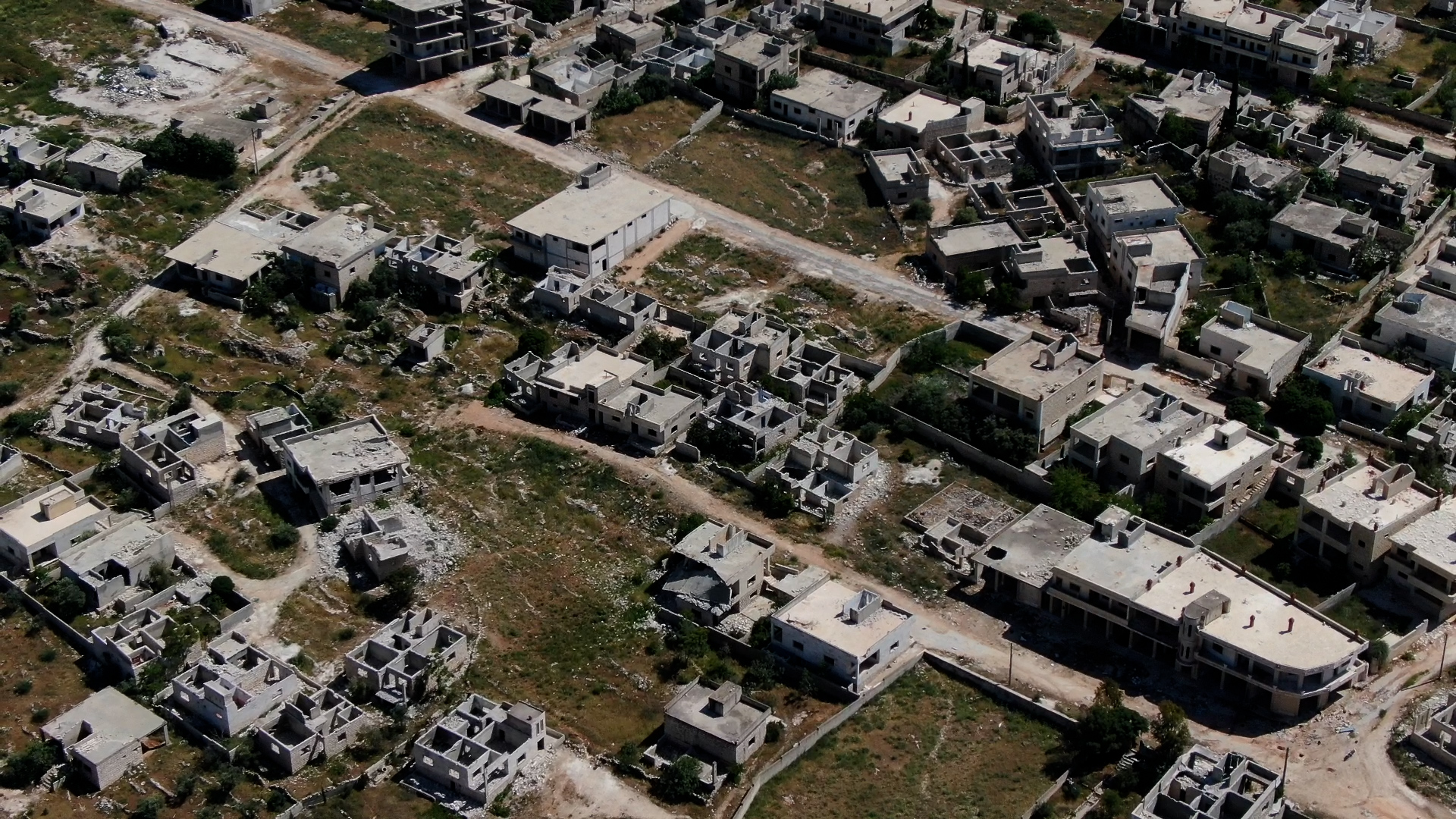 A drone picture of Kafrnabel in northern Syria, showing homes that have been stripped of their roofs and other construction material