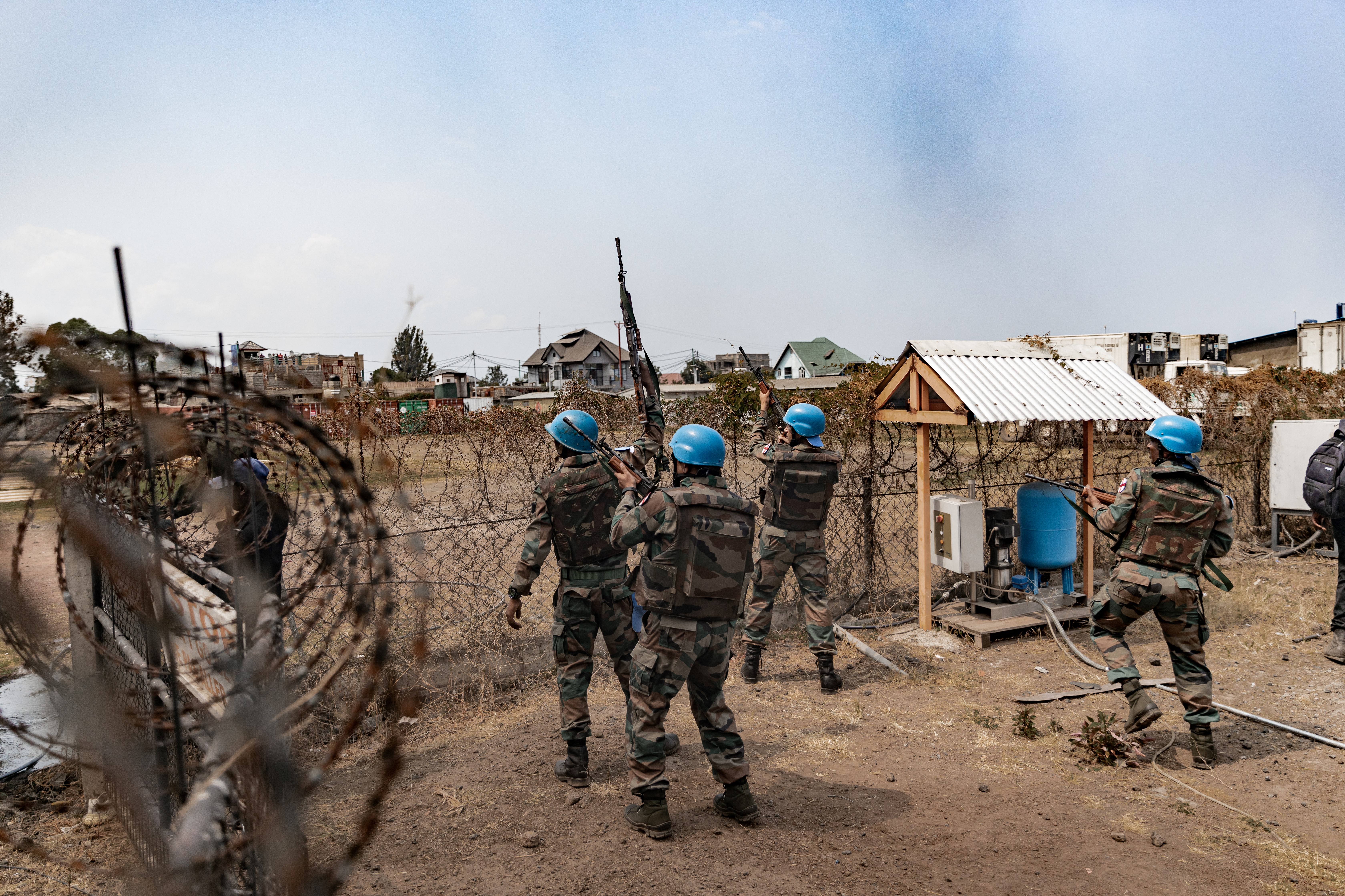 MONUSCO troops try to repel a protest