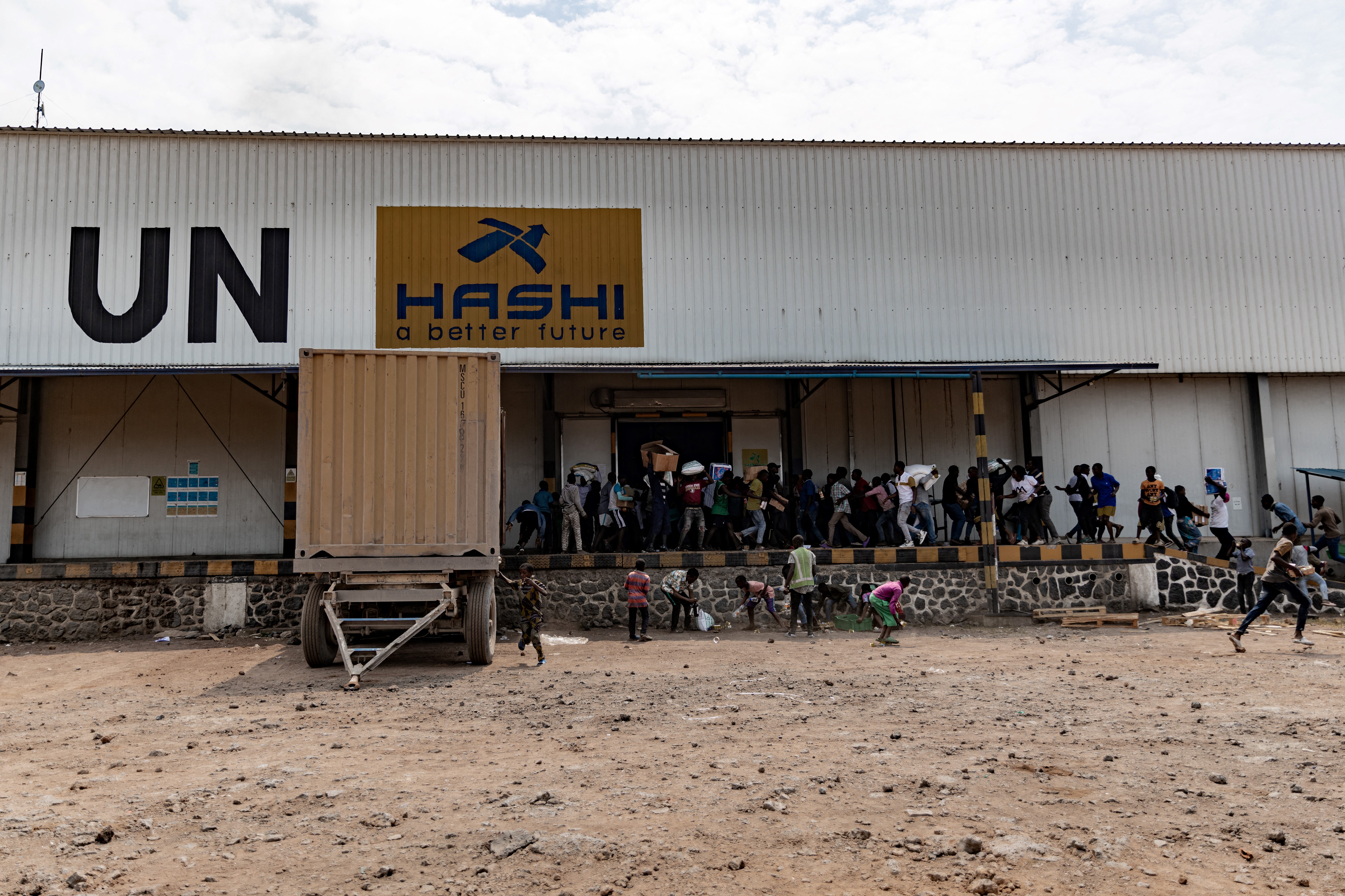 Protesters loot a warehouse