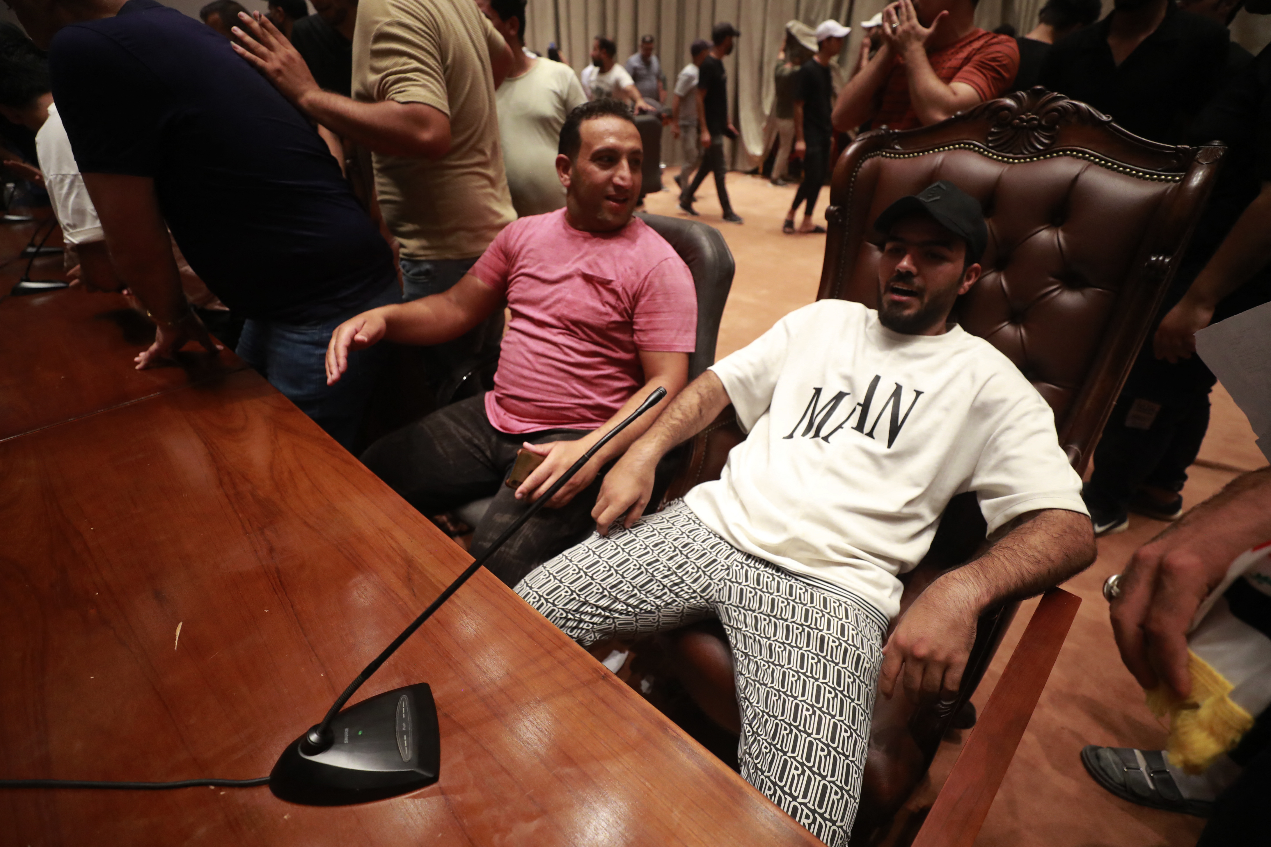 Supporters of the Iraqi cleric Moqtada Sadr gather inside the Iraqi parliament