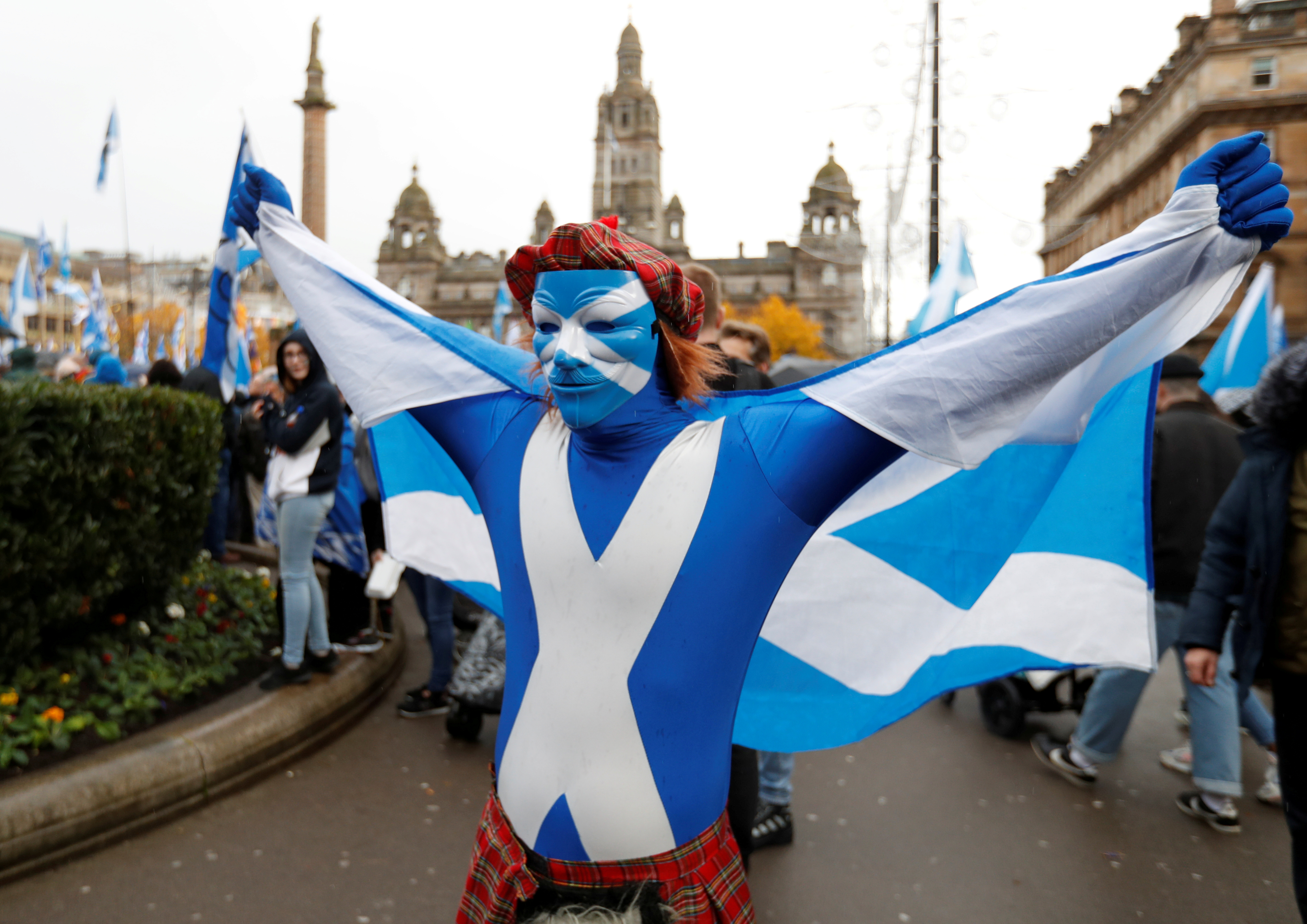 A demonstrator holds a flag during a pro-Scottish Independence rally in Glasgow.