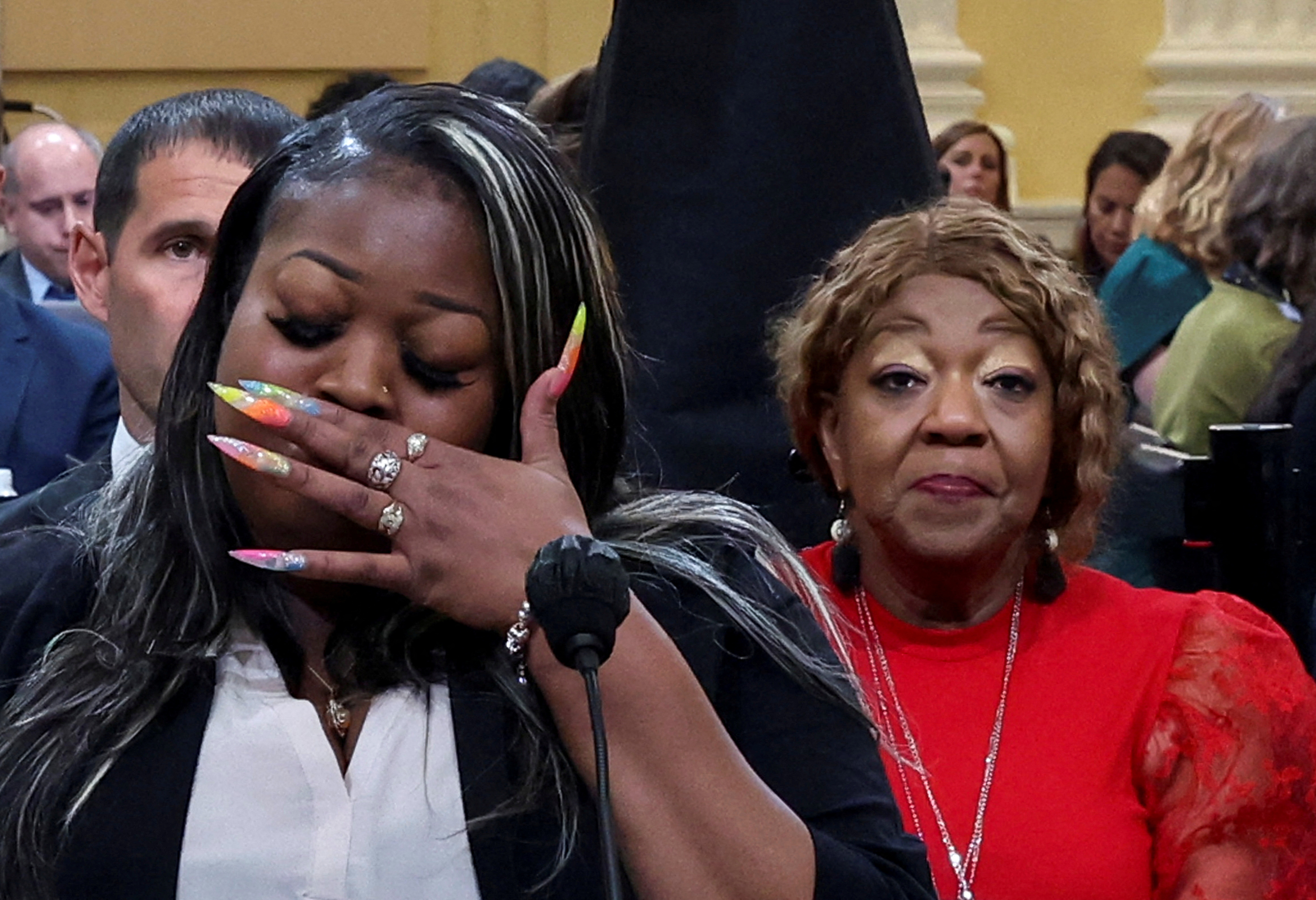 Wandrea "Shaye" Moss, former Elections Department employee in Fulton County, Georgia, testifies, as her mother, Georgia election worker Ruby Freeman looks on