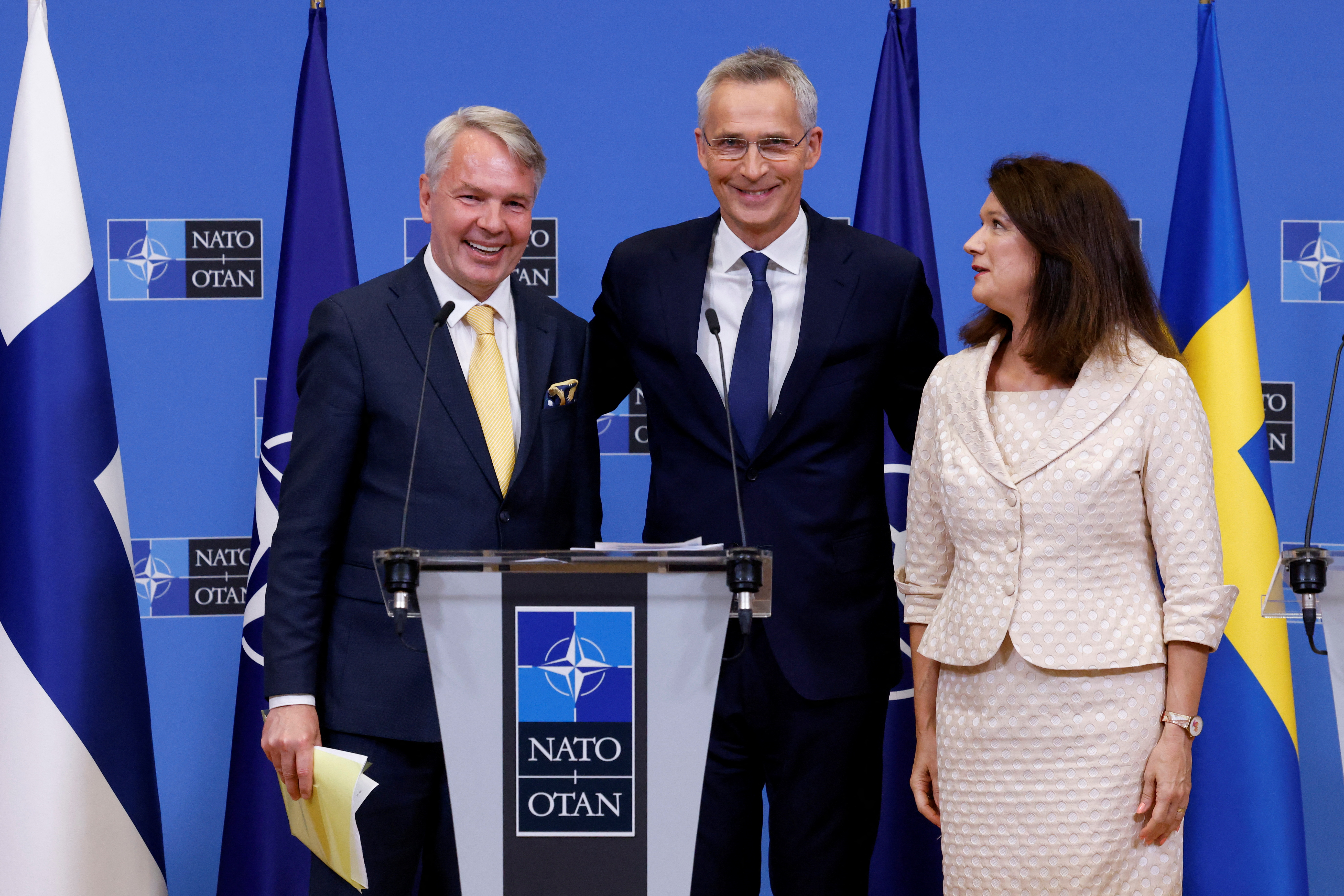 Sweden's Foreign Minister Ann Linde and Finland's Foreign Minister Pekka Haavisto with with NATO Secretary General Jens Stoltenberg