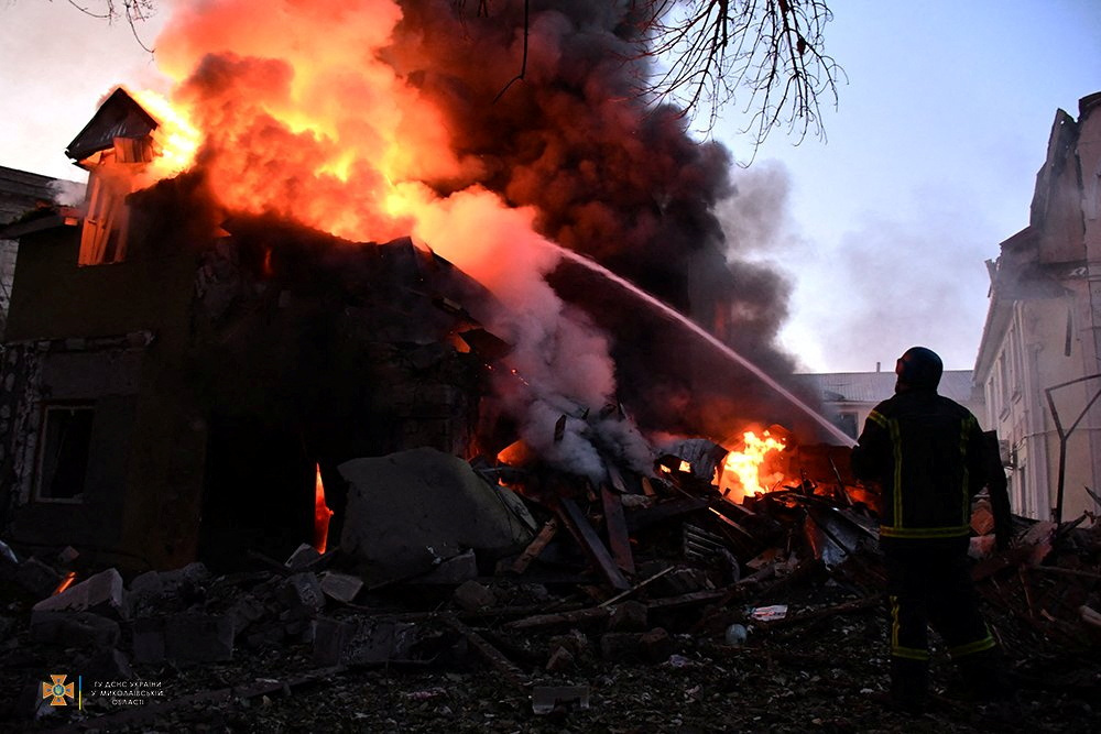 A firefighter works at a site