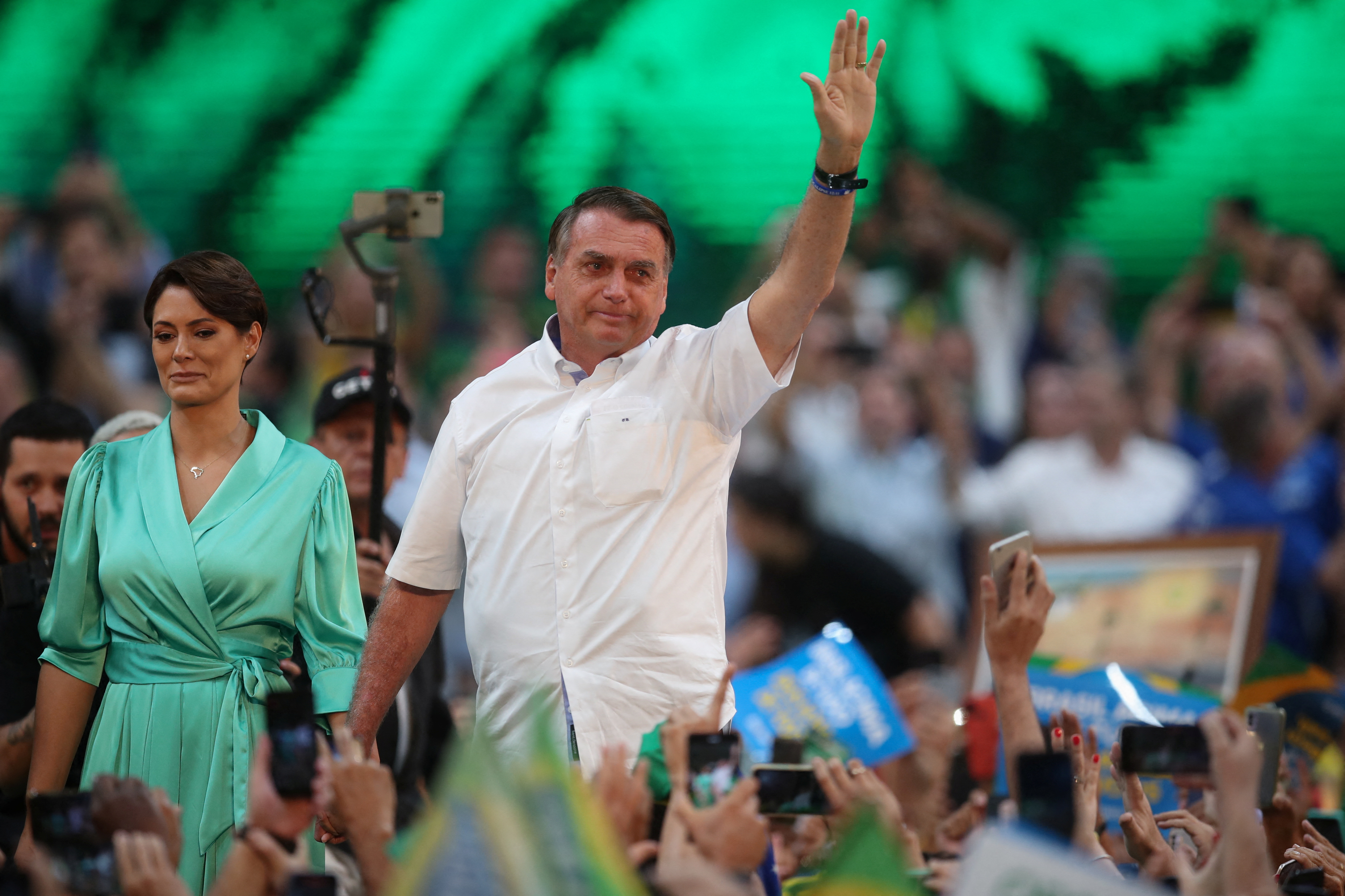 Brazil's President Jair Bolsonaro attends the launching ceremony along with his wife Michelle Bolsonaro to officially become a candidate for the presidential re-election, in Rio de Janeiro, Brazil