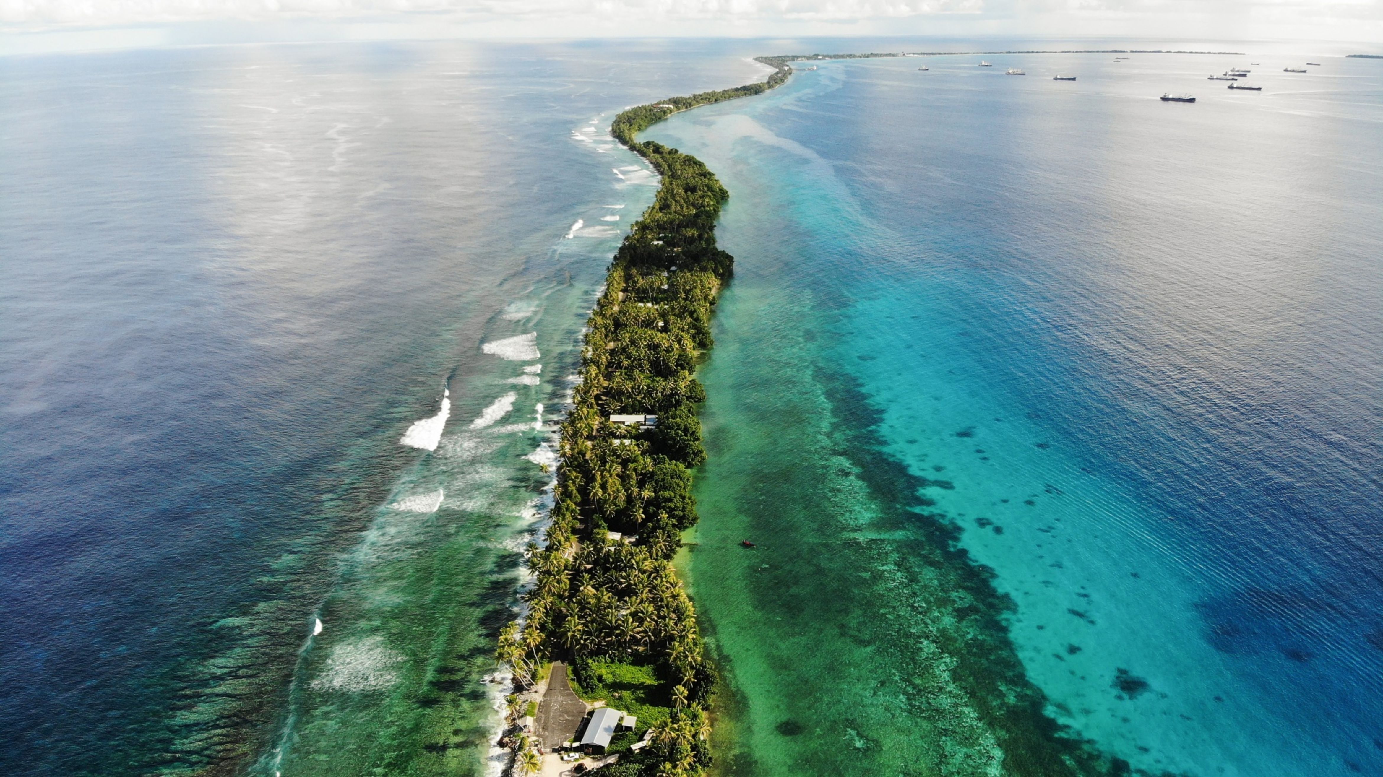 A strip of land between a lagoon and the Pacific Ocean in Tuvalu.