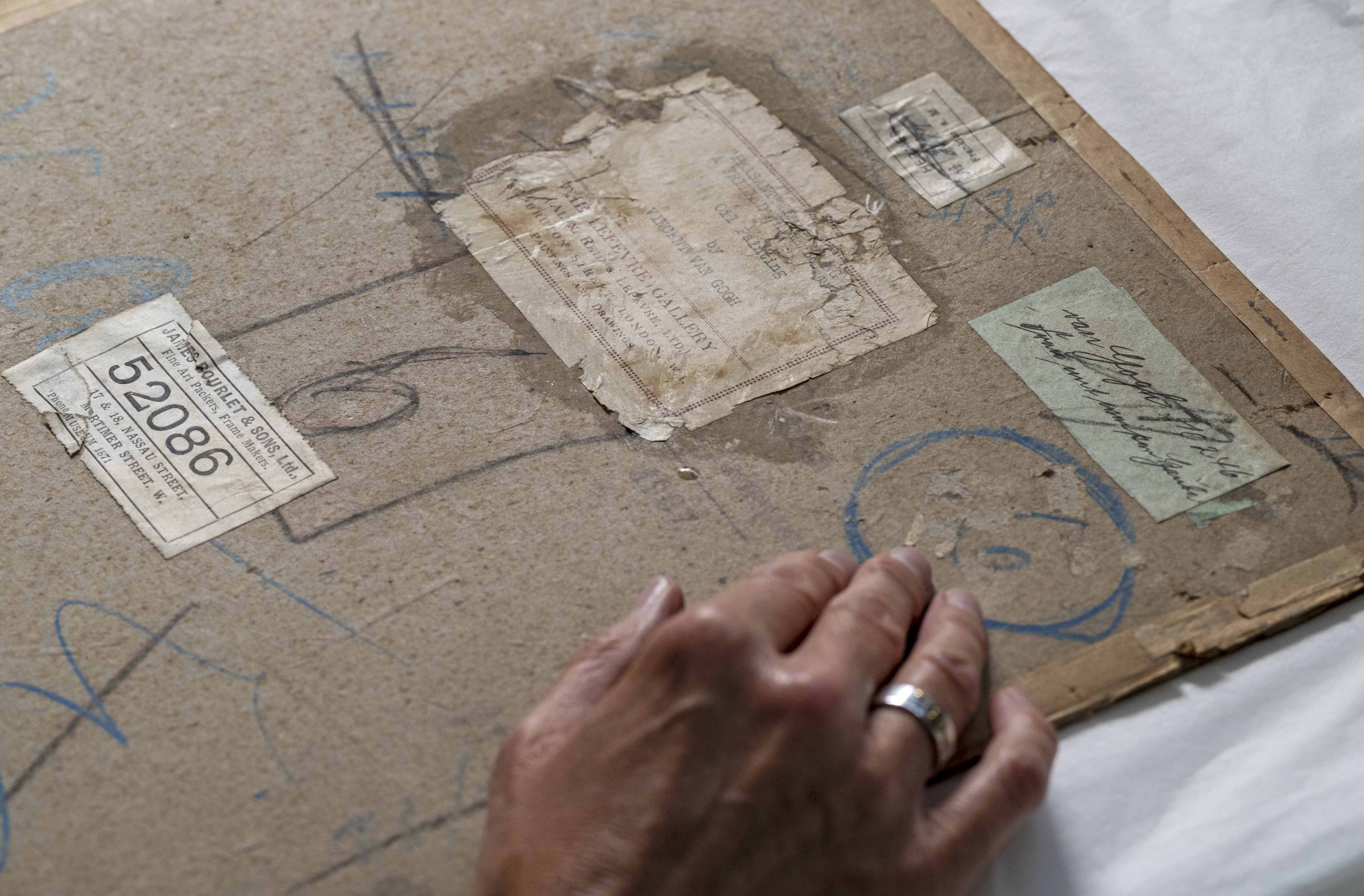 The back of the canvas that Van Gogh is thought to have used to save money.