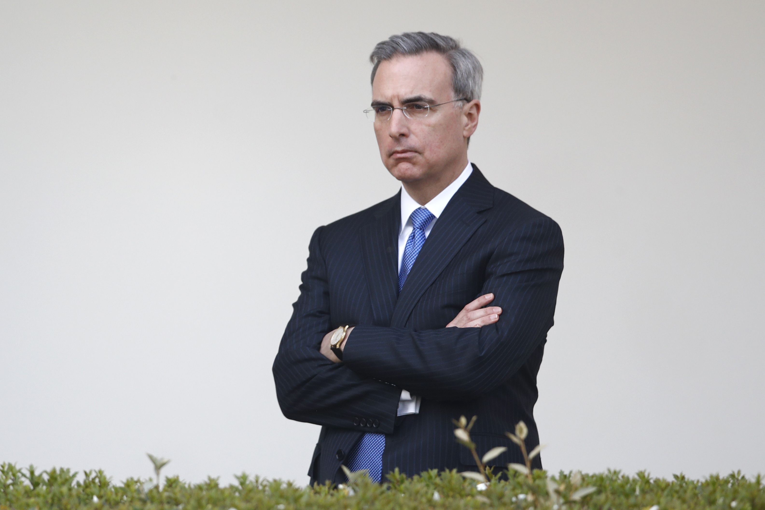 White House counsel Pat Cipollone listens as President Donald Trump speaks during a coronavirus task force briefing in the Rose Garden of the White House
