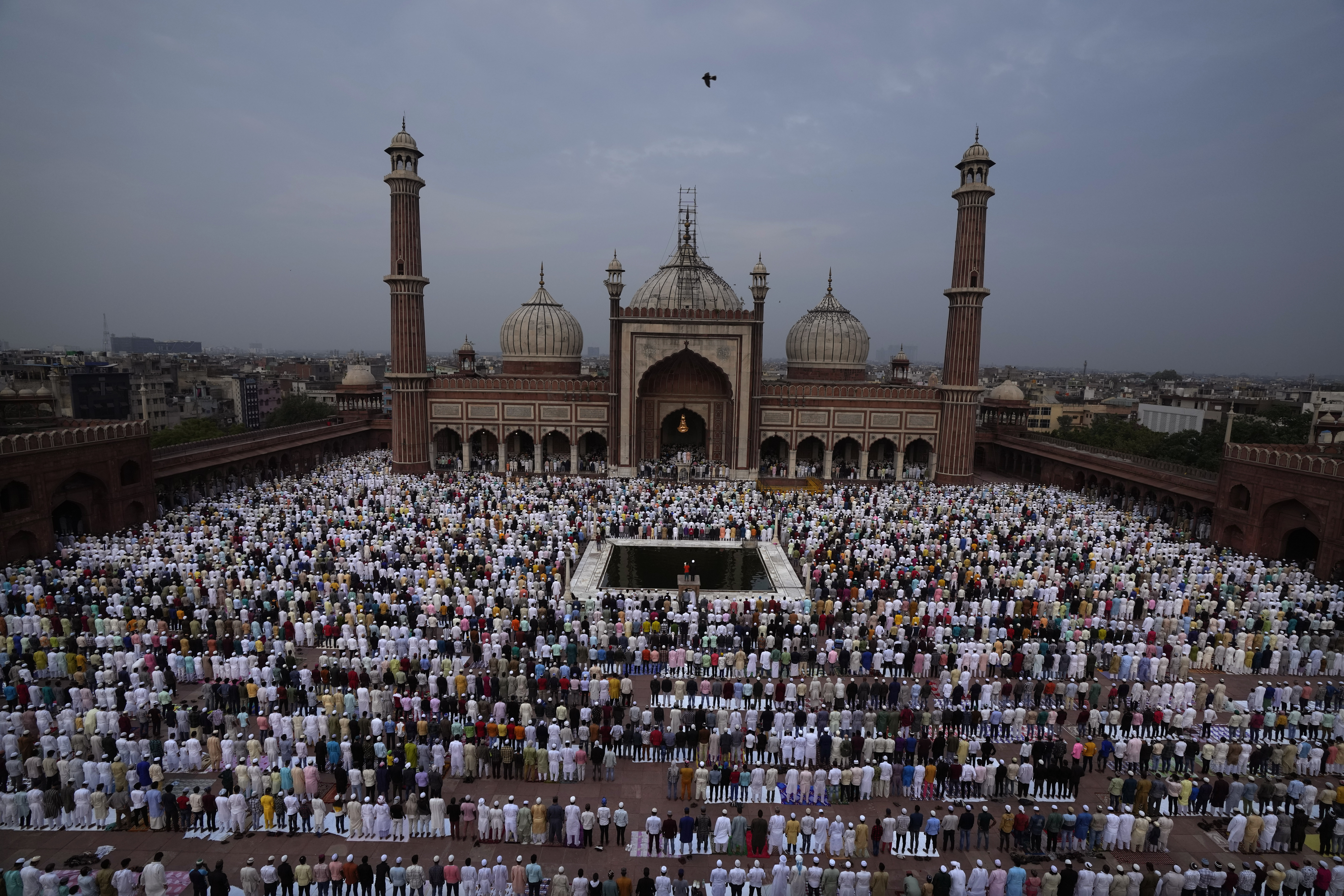 Muslims offer Eid al-Adha prayers at the Jama Masjid, in New Delhi