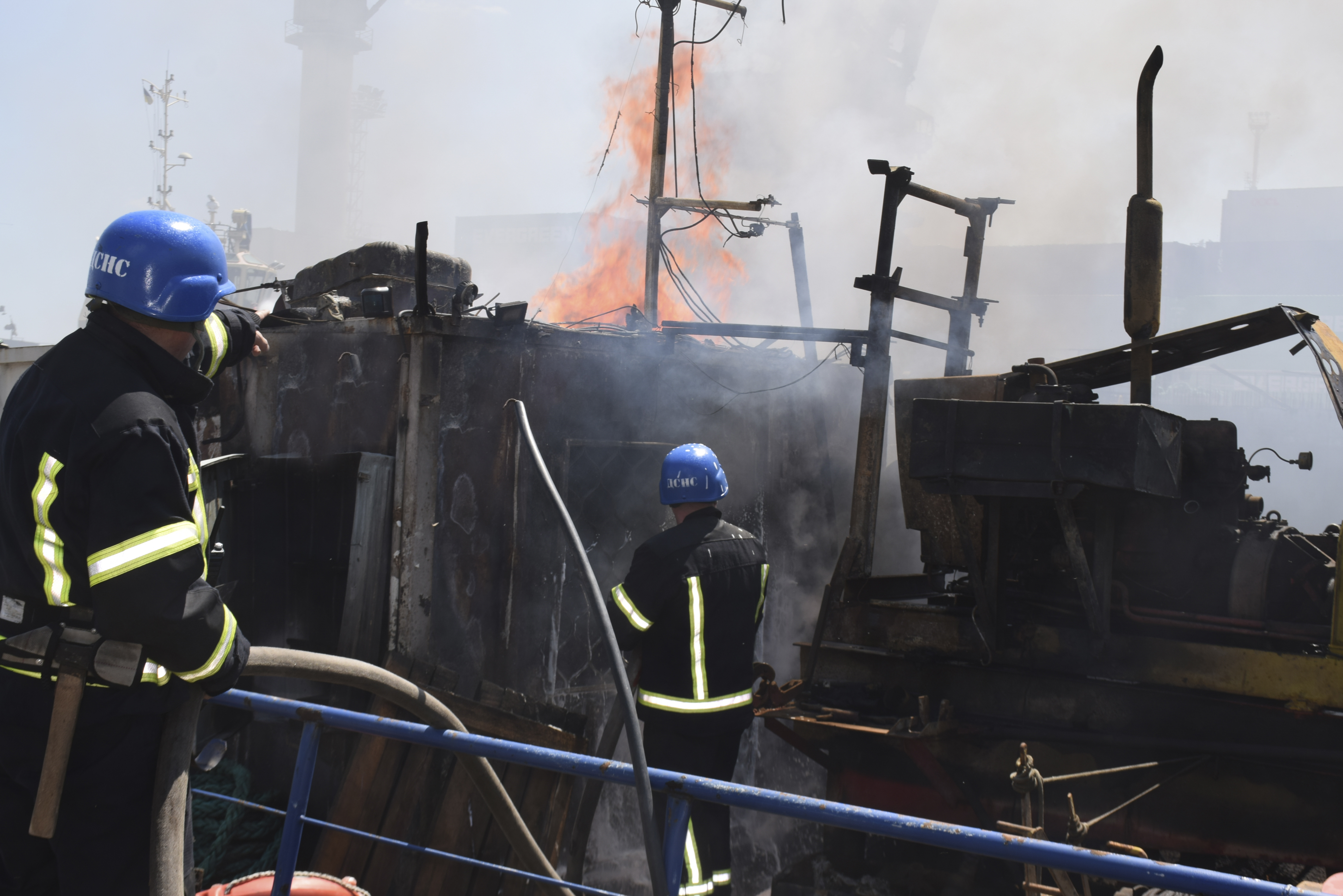 Firefighters put out a fire in a port after a Russian missiles attack in Odesa, Ukraine
