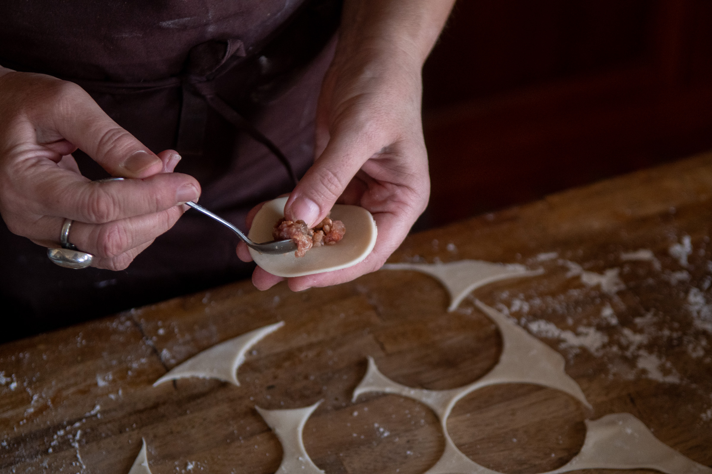 Filling the meat filled Pelmeni dumplings