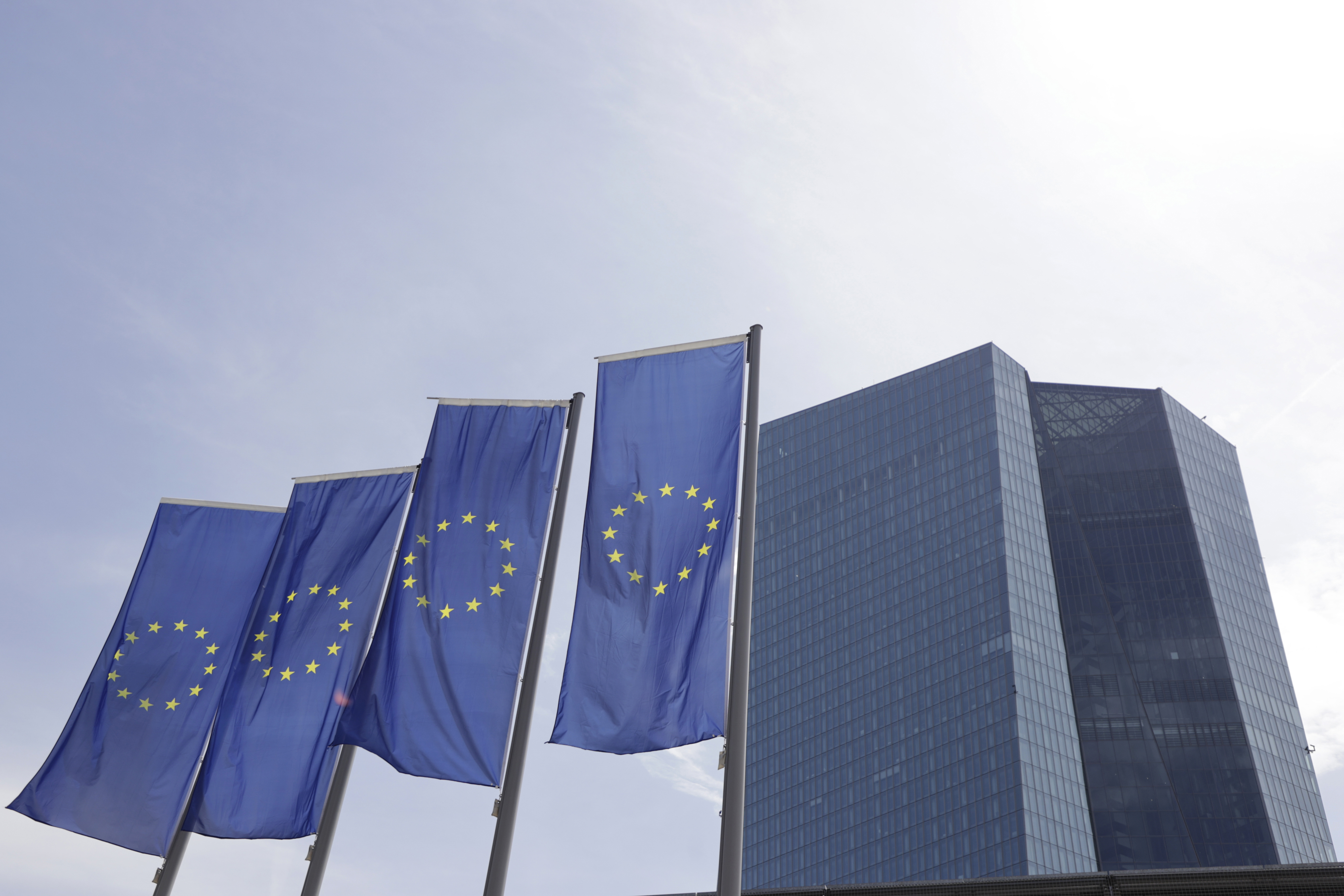 Flags of the European Union (EU) outside the headquarters of the European Central Bank (ECB) in Frankfurt, Germany, on Monday, May 23, 2022. While ECB policy makers have increasingly coalesced around the prospect of a first hike at their July 21 meeting in recent weeks, they have barely mentioned the possibility of a more aggressive half-point move such as the US Federal Reserve delivered this month. 