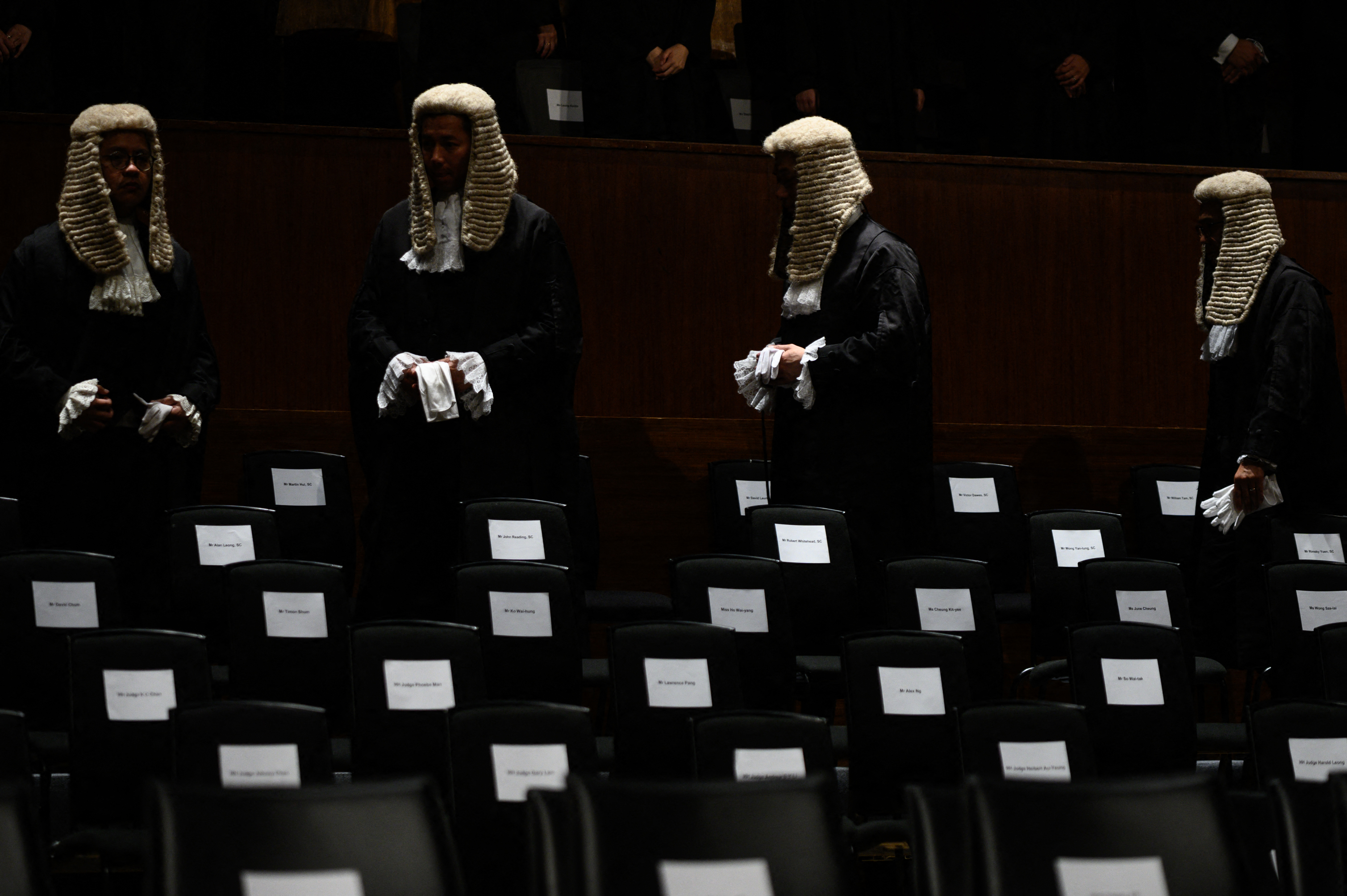 Judges wearing robes and horsehair wigs attend a ceremony to mark the opening of the legal year in Hong Kong