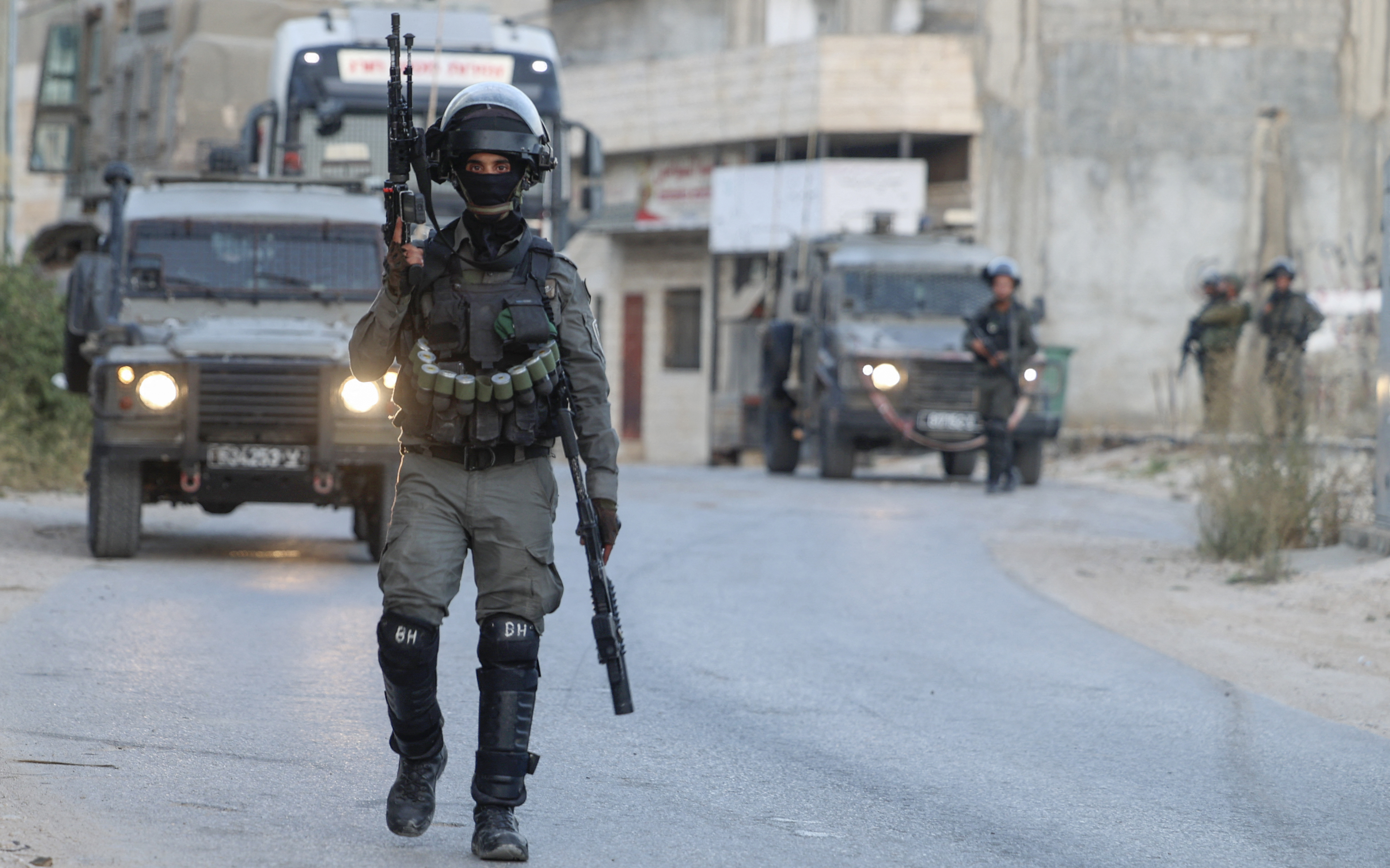 Members of the Israeli army deploy to demolish houses in in Rummanah town in the occupied West Bank, on August 8, 2022. - Israeli security forces arrested Subaihat, 20, and Yussef Al-Rifai, 19, in May 2022 on suspicion of killing three Israelis in the central town of Elad.