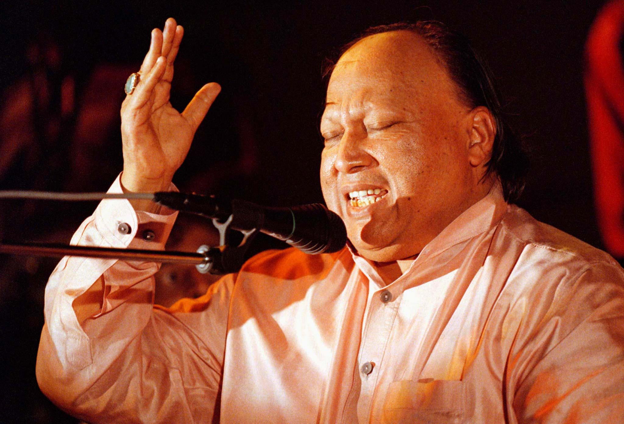 Pakistani singer Nusrat Fateh Ali Khan performs at the 'Pakistan 4 U', a live concert in the port city of Karachi May 4