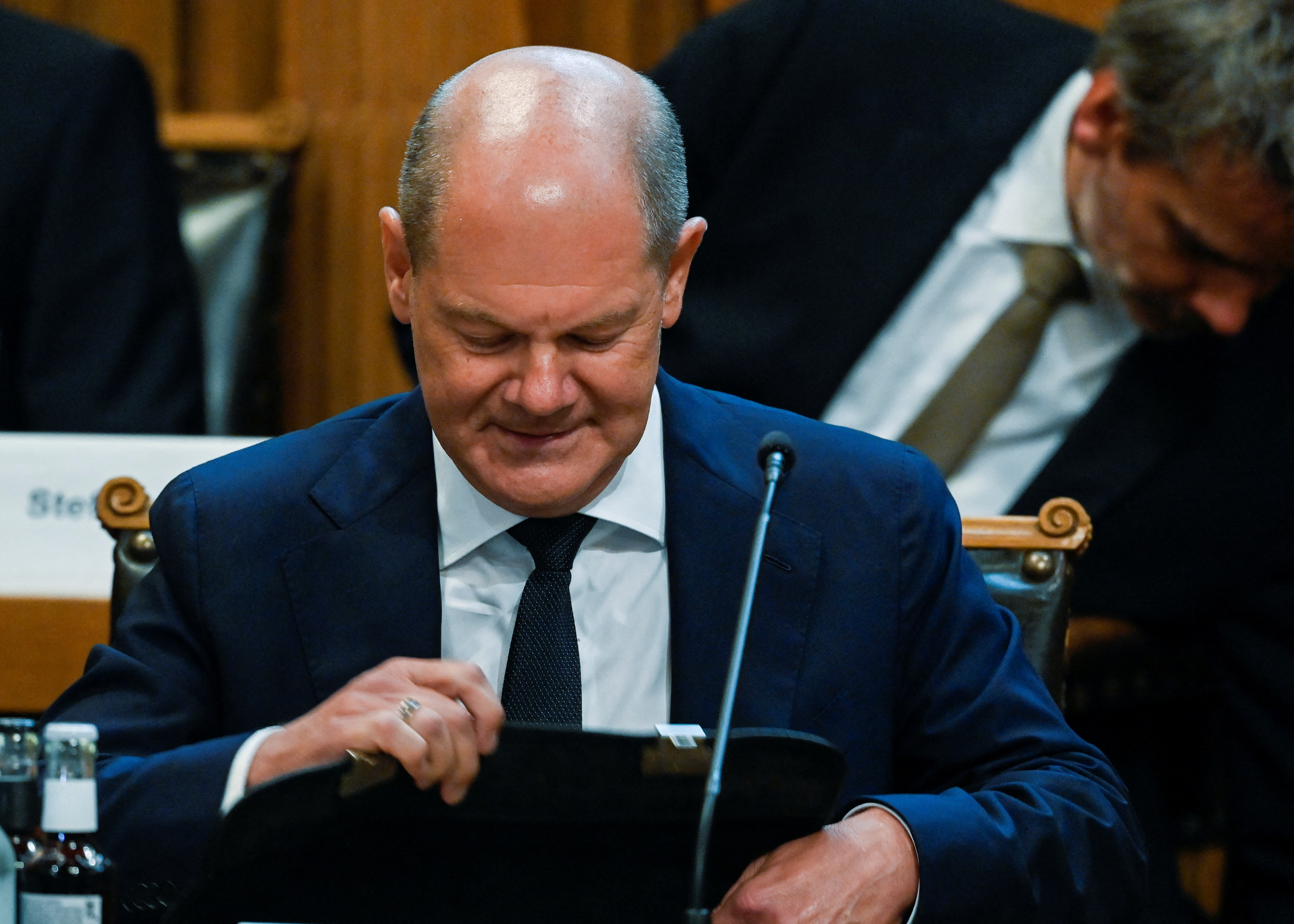 Germany's Chancellor Olaf Scholz attends a session to answer parliamentarians' questions on Cum-Ex affair, at the plenary hall in the town hall, in Hamburg
