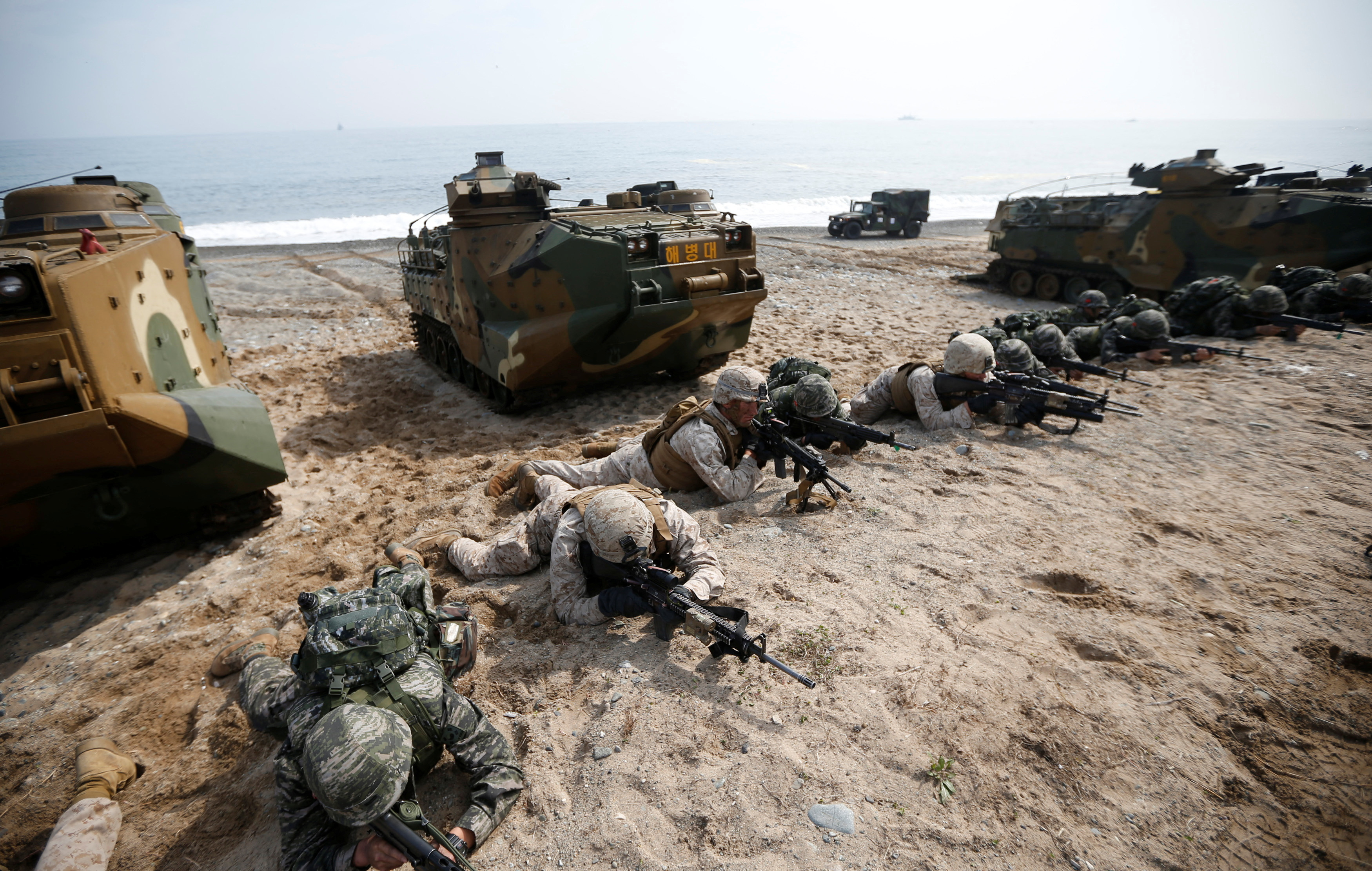 US and South Korean marines participate in a US-South Korea joint beach landing operation drill in Pohang, South Korea, March 31, 2014.