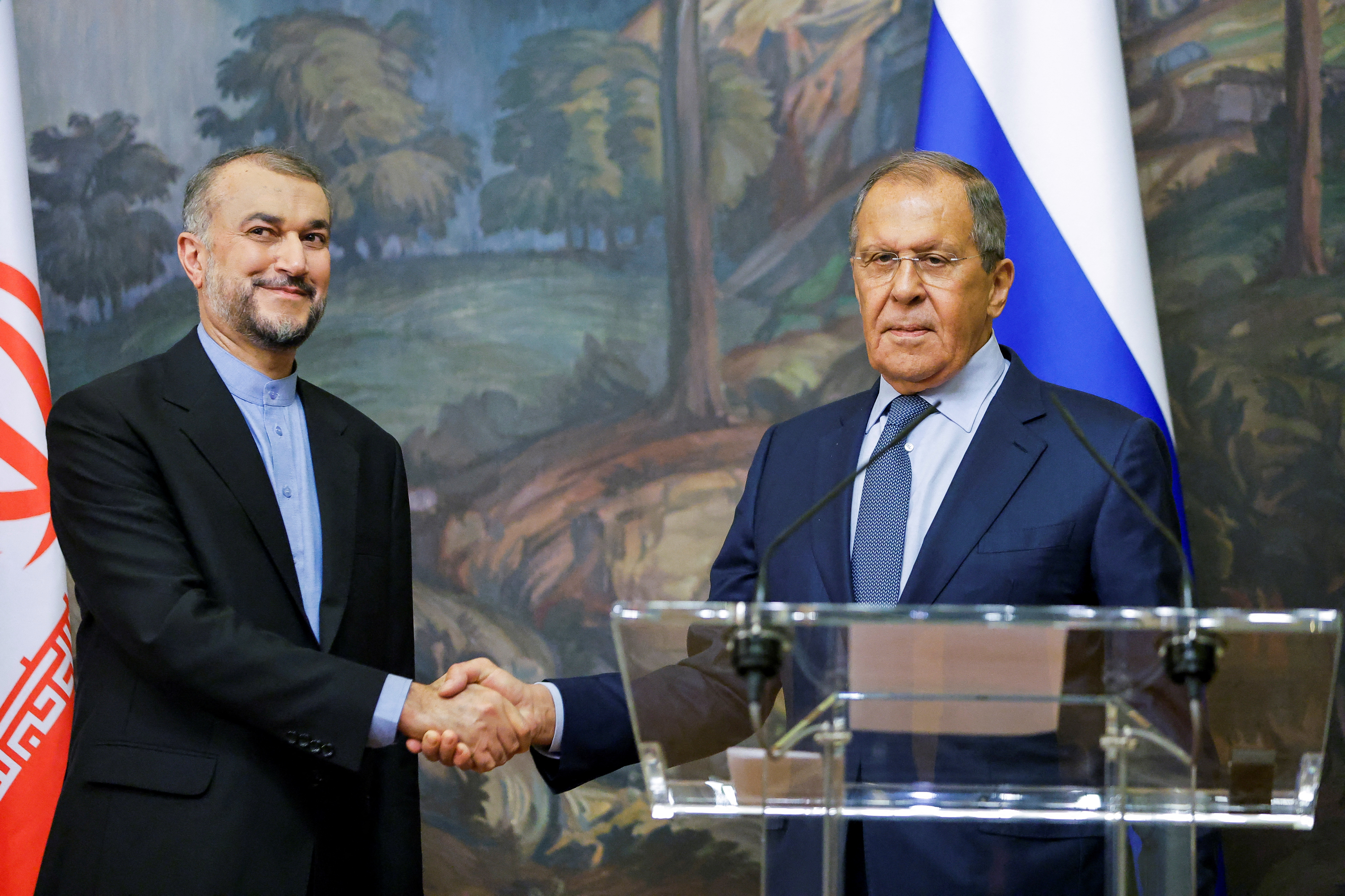 Russian Foreign Minister Sergei Lavrov shakes hands with Iranian Foreign Minister Hossein Amir-Abdollahian during a joint news conference in Moscow, Russia August 31, 2022. REUTERS/Maxim Shemetov/Pool