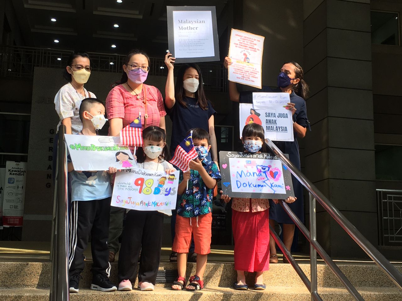 Malaysian mothers affected by unequal citizenship laws gathering in front of the National Registration Department in Putrajaya to check on the status of their citizenship submissions