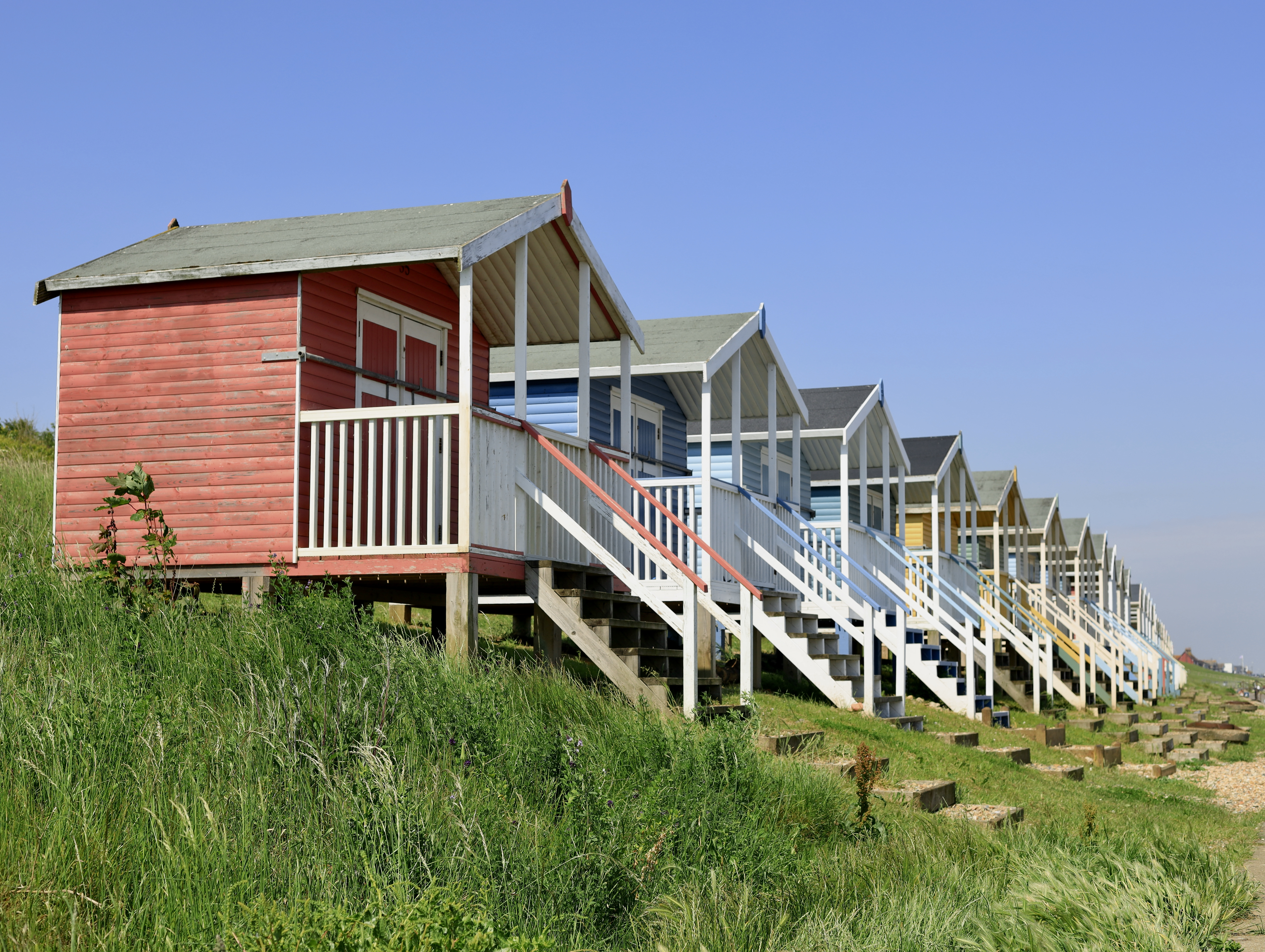Colourful beach huts on Minster on Sea’s beach.