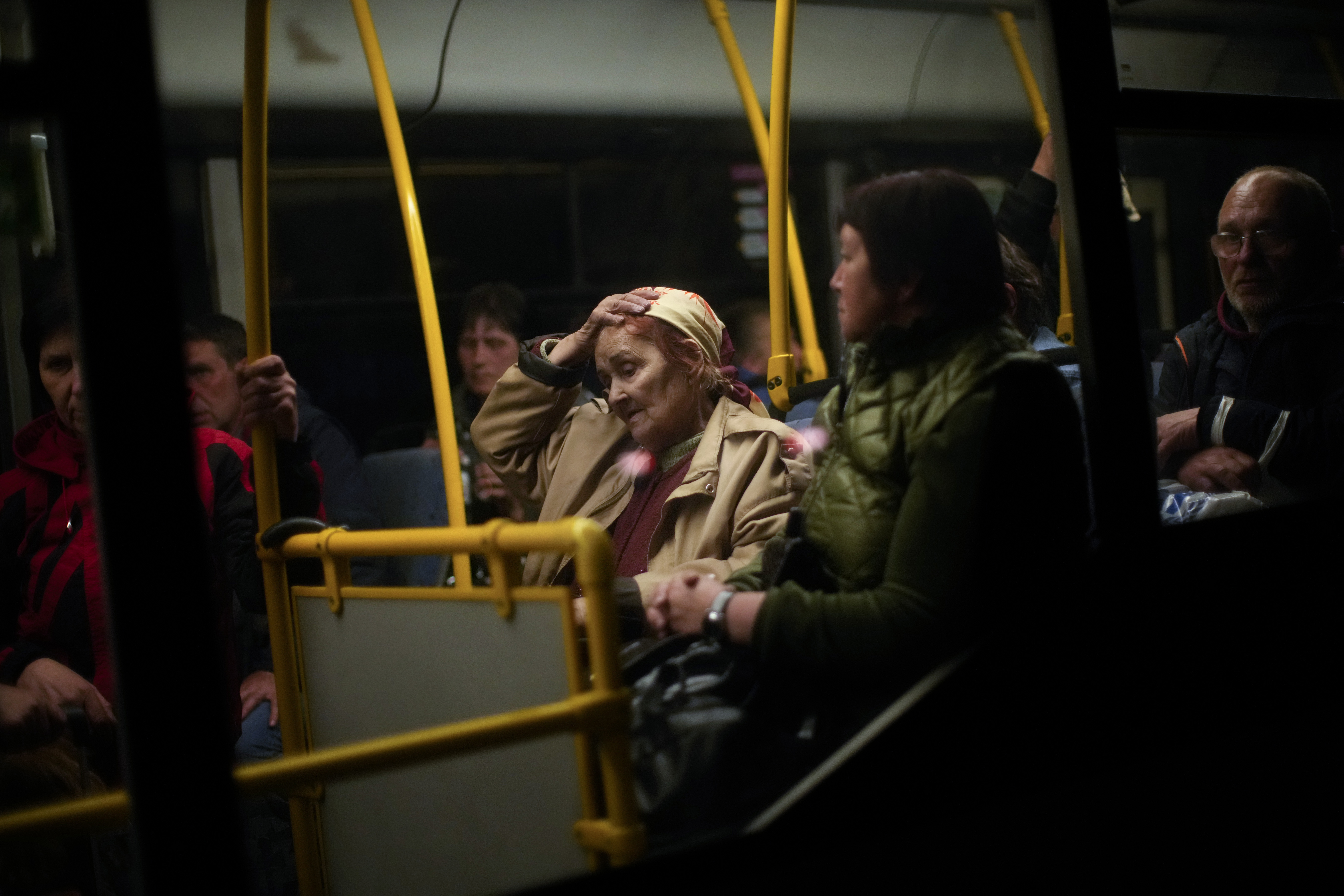 People who fled from Mariupol wait to leave