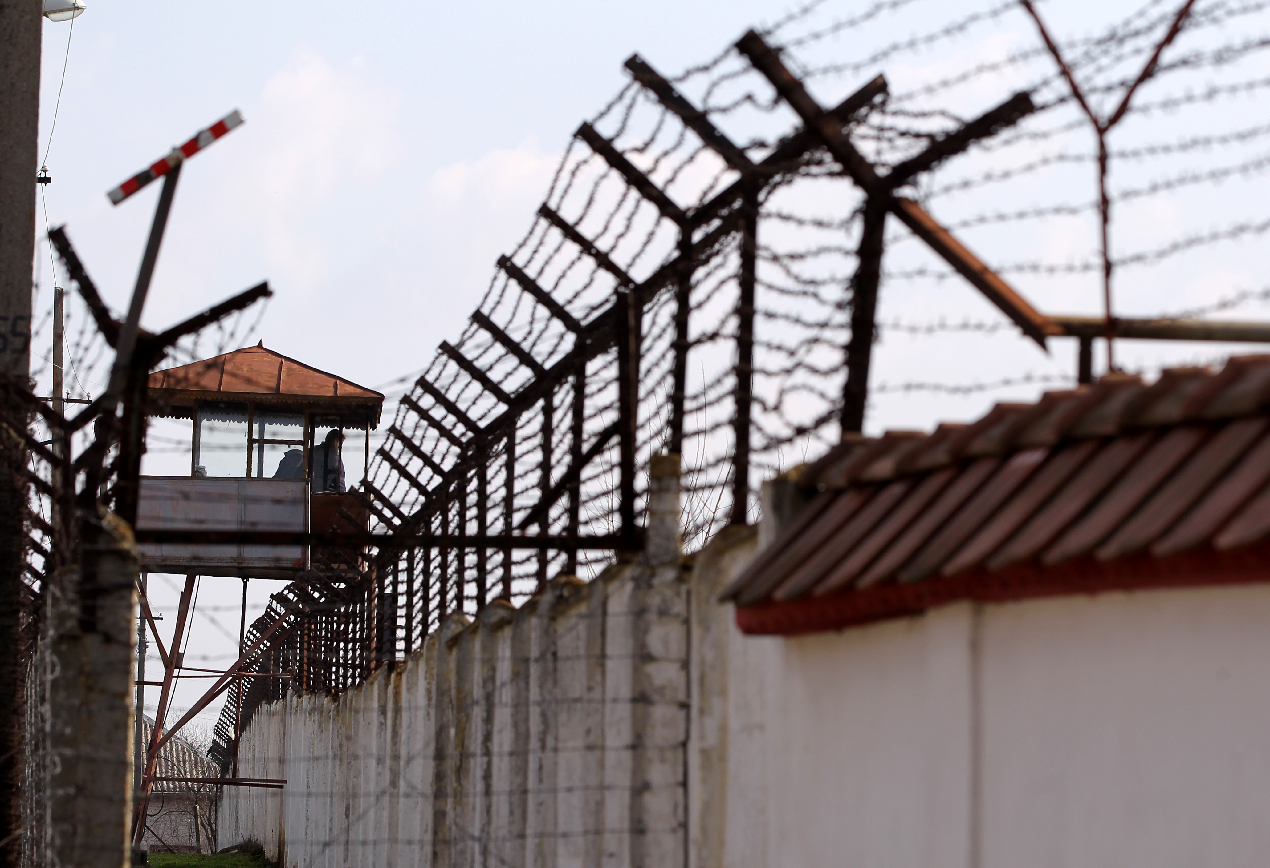 A view of the outside double barbed wire fence guarding the Jilava Penitentiary, near Bucharest
